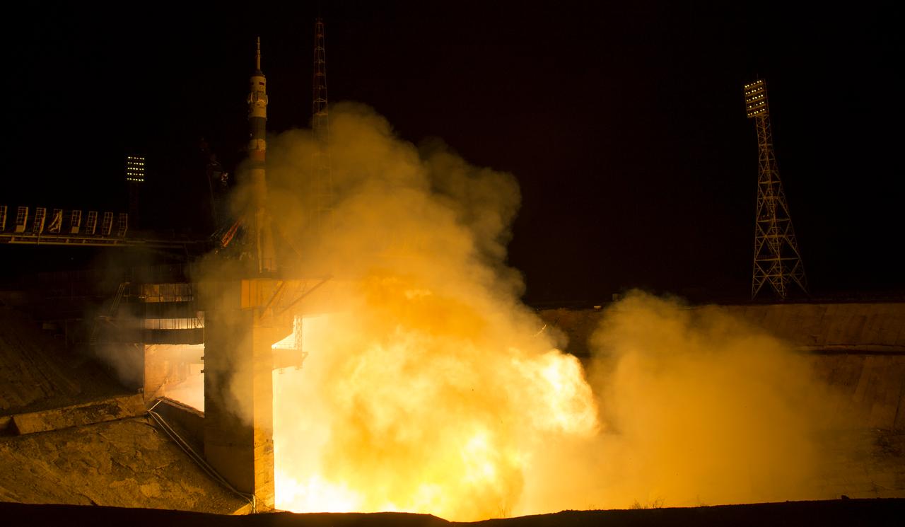 The Soyuz MS-08 rocket is launched with Expedition 55 Soyuz Commander Oleg Artemyev of Roscosmos and flight engineers Ricky Arnold and Drew Feustel of NASA, Wednesday, March 21, 2018 at the Baikonur Cosmodrome in Kazakhstan. Artemyev, Arnold, and Feustel will spend the next five months living and working aboard the International Space Station.  Photo Credit: (NASA/Joel Kowsky)