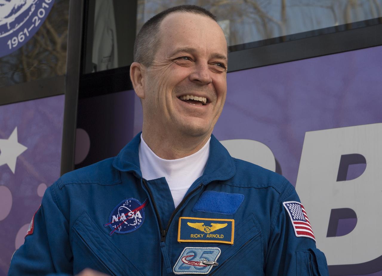 Expedition 55 Soyuz flight engineer Ricky Arnold of NASA is seen as he and fellow crewmates Oleg Artemyev of Roscosmos and Drew Feustel of NASA depart the Cosmonaut Hotel to suit-up for their Soyuz launch to the International Space Station, Wednesday, March 21, 2018 in Baikonur, Kazakhstan. Arnold, Artemyev, and Feustel launched aboard the Soyuz MS-08 spacecraft at 1:44 p.m. Eastern time (11:44 p.m. Baikonur time) on March 21 to begin their journey to the International Space Station. Photo Credit: (NASA/Joel Kowsky)