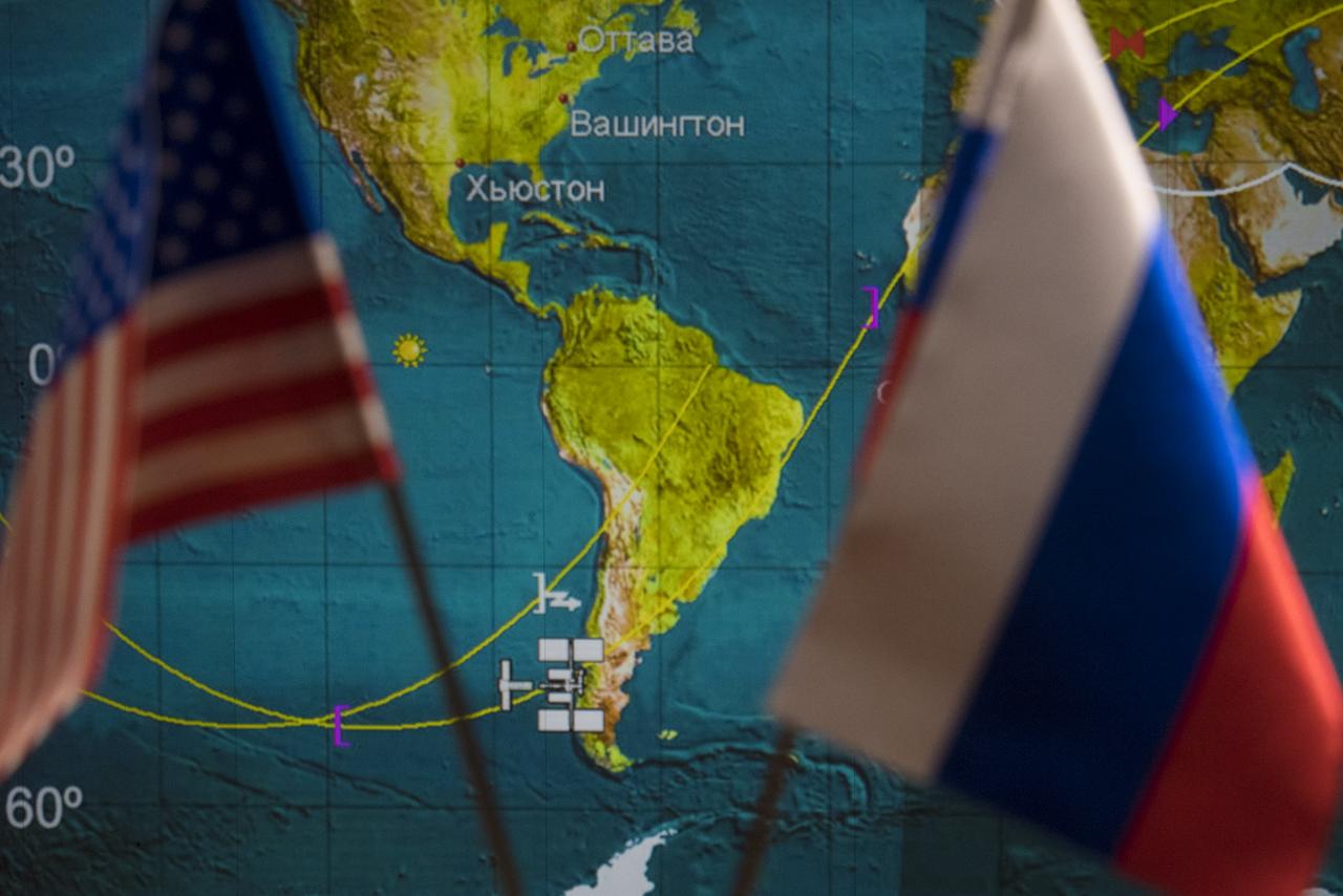 Icons for the International Space Station and Soyuz MS-08 spacecraft are seen on a tracking map on a screen in the Moscow Mission Control Center as the spacecraft approaches for docking, Friday, March 23, 2018 in Korolev, Russia. The Soyuz MS-08 spacecraft carrying Expedition 55-56 crewmembers Oleg Artemyev of Roscosmos and Ricky Arnold and Drew Feustel of NASA docked at 3:40 p.m. Eastern time (10:40 p.m. Moscow time) on March 23 and joined Expedition 55 Commander Anton Shkaplerov of Roscosmos, Scott Tingle of NASA, and Norishige Kanai of the Japan Aerospace Exploration Agency (JAXA). Photo Credit: (NASA/Joel Kowsky)