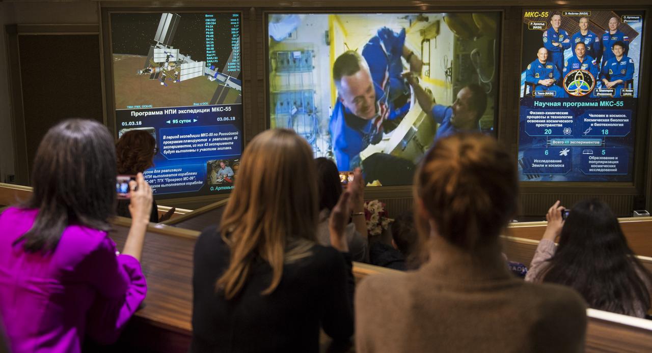 Expedition 55 flight engineer Ricky Arnold of NASA is seen after the hatches were opened between the Soyuz MS-08 spacecraft and the International Space Station on screens at the Moscow Mission Control Center in Korolev, Russia, Saturday, March 24, 2018, a few hours after the Soyuz MS-08 docked to the International Space Station. Hatches were opened at 5:48 p.m. Eastern time on March 23 (12:48 a.m. Moscow time on March 24) and Arnold, Oleg Artemyev of Roscosmos, and Drew Feustel of NASA joined Expedition 55 Commander Anton Shkaplerov of Roscosmos, Scott Tingle of NASA, and Norishige Kanai of the Japan Aerospace Exploration Agency (JAXA) onboard the orbiting laboratory.  Photo Credit: (NASA/Joel Kowsky)