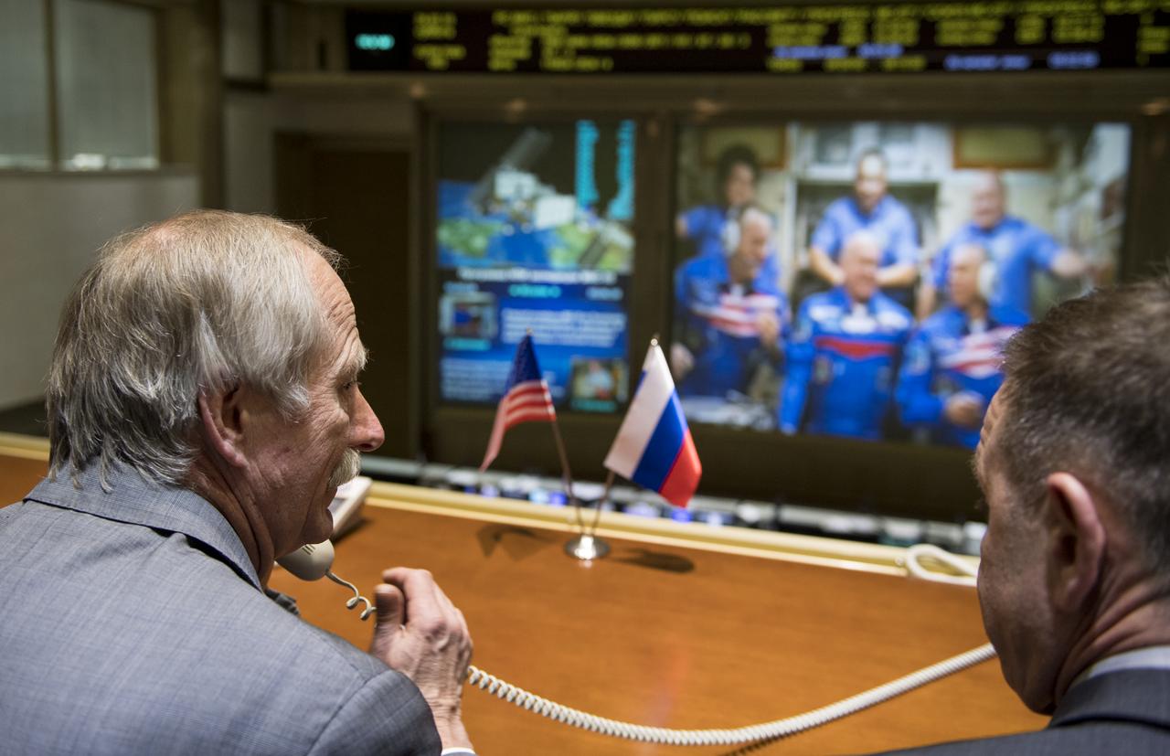 NASA Associate Administrator for the Human Exploration and Operations Mission Directorate Bill Gerstenmaier speaks with the Soyuz MS-08 crew from the Moscow Mission Control Center in Korolev, Russia a few hours after the Soyuz MS-08 docked to the International Space Station on Saturday, March 24, 2018. Hatches were opened at 5:48 p.m. Eastern time on March 23 (12:48 a.m. Moscow time on March 24) and Oleg Artemyev of Roscosmos, Ricky Arnold of NASA and Drew Feustel of NASA joined Expedition 55 Commander Anton Shkaplerov of Roscosmos, Scott Tingle of NASA, and Norishige Kanai of the Japan Aerospace Exploration Agency (JAXA) onboard the orbiting laboratory.  Photo Credit: (NASA/Joel Kowsky)