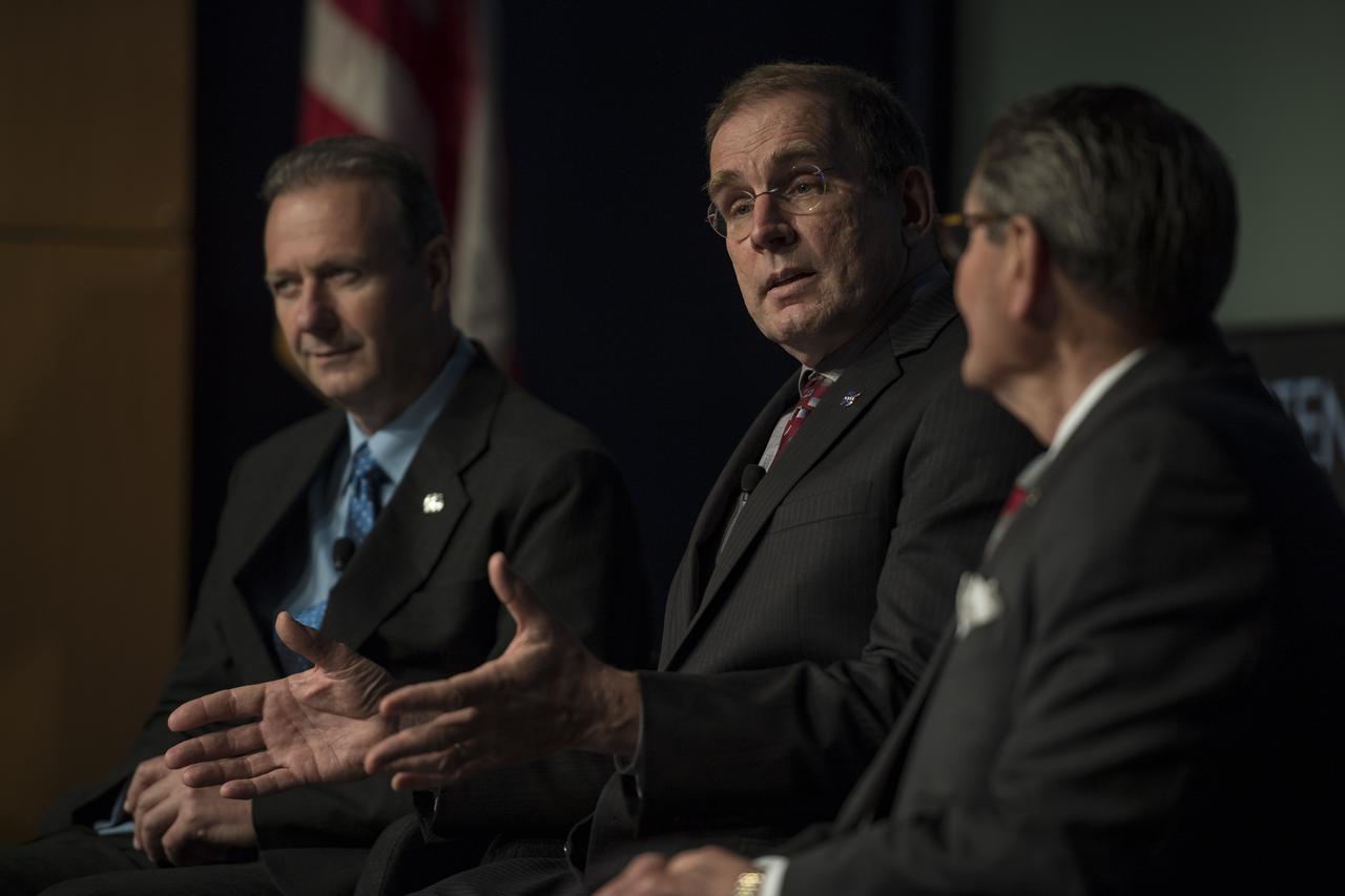 Peter Coen, project manager, Commercial Supersonics Technology Project, Langley Research Center, NASA, speaks on a panel with Peter Iosifidis, Lockheed Martin, left, and Dr. Ed Waggoner, NASA, right, at a briefing on the Low Boom Flight Demonstrator, Tuesday, April 3, 2018 at NASA Headquarters in Washington. This new experimental aircraft will cut cross country travel times in half by flying faster than the speed of sound without creating a sonic boom, enabling travel from New York to Los Angeles in two hours. Photo Credit: (NASA/Aubrey Gemignani)