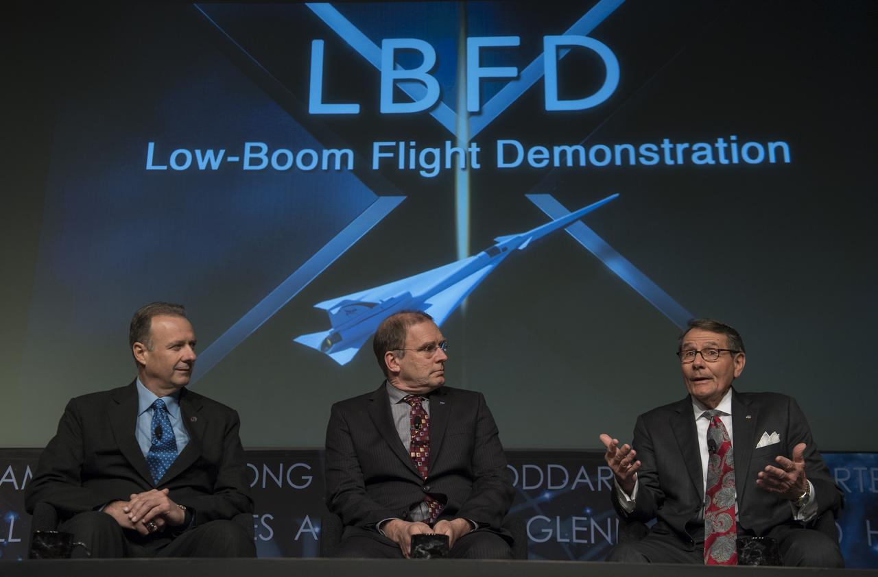 Dr. Ed Waggoner, program director, Integrated Aviation Systems Program, NASA, right, speaks on a panel with Peter Iosifidis, program manager, Low-Boom Flight Demonstrator, Lockheed Martin Skunk Works, left, and Peter Coen, project manager, Commercial Supersonics Technology Project, Langley Research Center, NASA, center, at a briefing on the Low Boom Flight Demonstrator, Tuesday, April 3, 2018 at NASA Headquarters in Washington. This new experimental aircraft will cut cross country travel times in half by flying faster than the speed of sound without creating a sonic boom, enabling travel from New York to Los Angeles in two hours. Photo Credit: (NASA/Aubrey Gemignani)