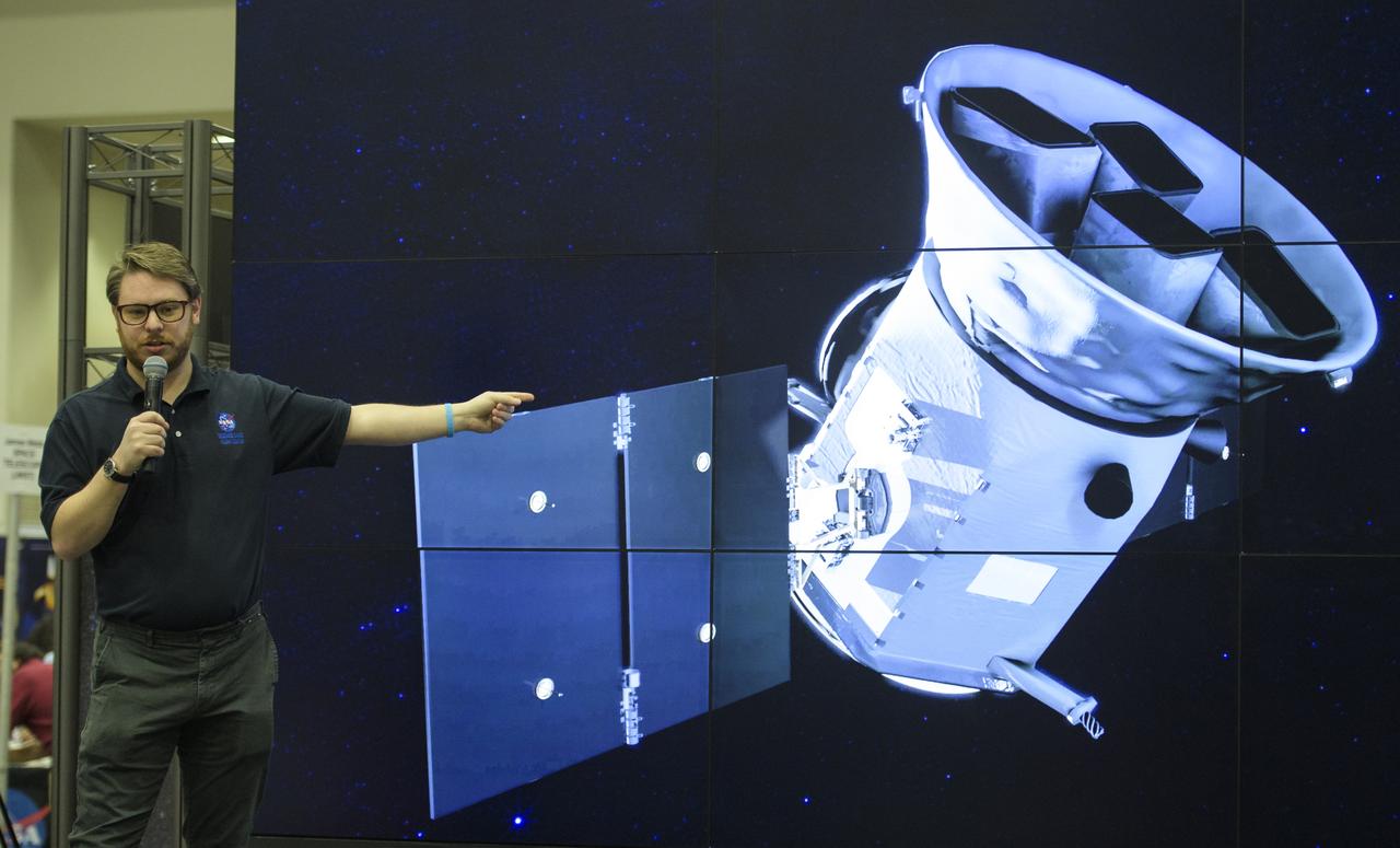 Tom Barclay, Director of the Kepler/K2 Guest Observer Office at NASA's Ames Research Center, speaks about exoplanets and NASA's next exoplanet mission, the Transiting Exoplanet Survey Satellite, during Sneak Peek Friday at the USA Science and Engineering Festival, Friday, April 6, 2018 at the Walter E. Washington Convention Center in Washington, DC.  The festival is open to the public April 7-8.  Photo Credit: (NASA/Joel Kowsky)