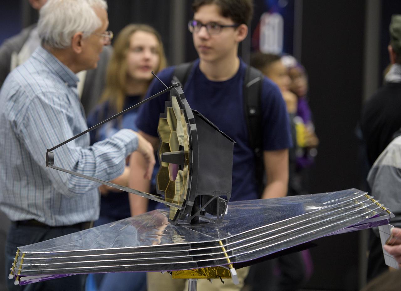 A model of NASA's James Webb Space Telescope is seen during Sneak Peek Friday at the USA Science and Engineering Festival, Friday, April 6, 2018 at the Walter E. Washington Convention Center in Washington, DC.  The festival is open to the public April 7-8.  Photo Credit: (NASA/Joel Kowsky)