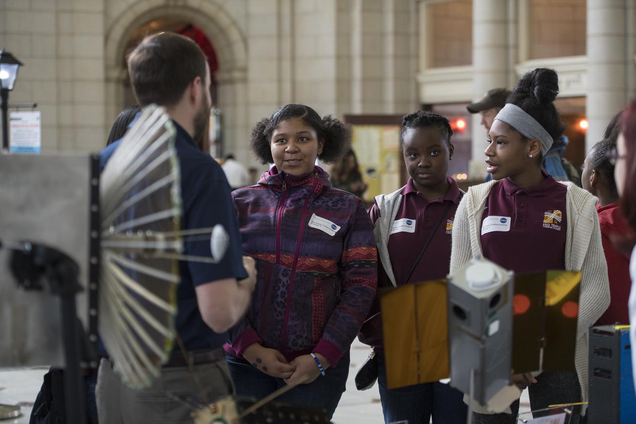 Visitors explore one of NASA's exhibits at the Earth Day event on Thursday, April 19, 2018 at Union Station in Washington, D.C. Photo Credit: (NASA/Aubrey Gemignani)