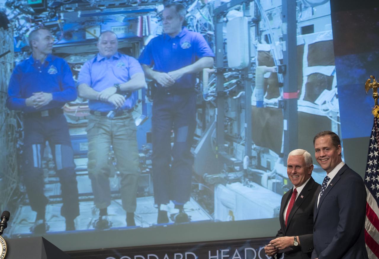 Vice President Mike Pence and NASA Administrator Jim Bridenstine talk with NASA astronauts Andrew Feustel, Scott Tingle, and Ricky Arnold who are onboard the International Space Station, Monday, April 23, 2018 at NASA Headquarters in Washington. Bridenstine was just sworn in by the Vice President as NASA's 13th Administrator. Photo Credit: (NASA/Joel Kowsky)