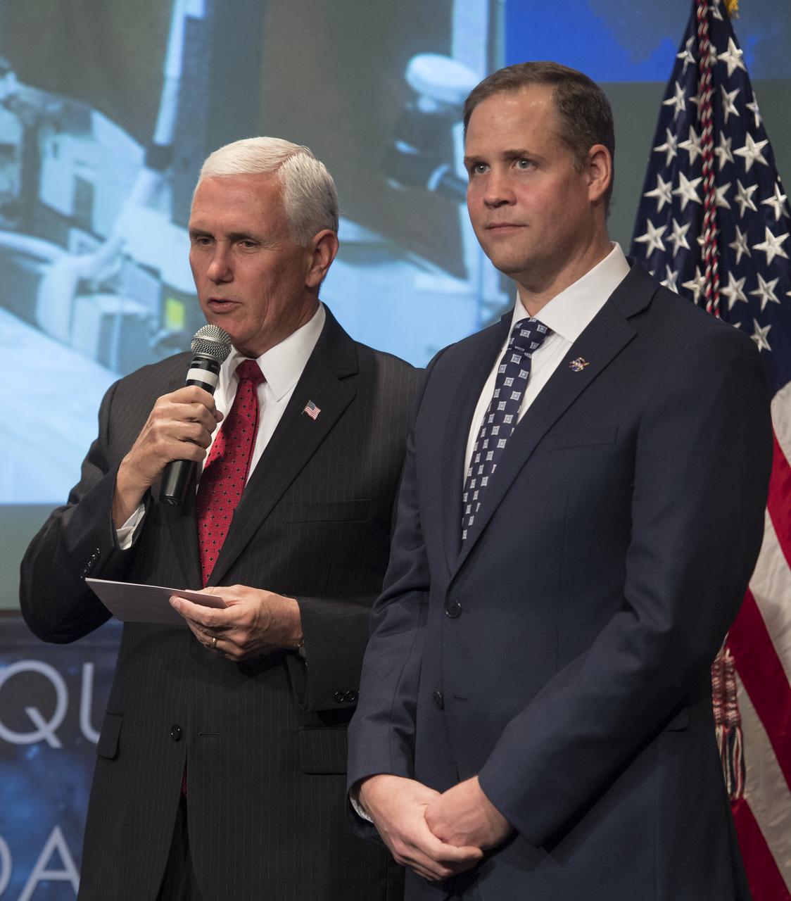 Vice President Mike Pence and NASA Administrator Jim Bridenstine talk with NASA astronauts Andrew Feustel, Scott Tingle, and Ricky Arnold who are onboard the International Space Station, Monday, April 23, 2018 at NASA Headquarters in Washington. Bridenstine was just sworn in by the Vice President as NASA's 13th Administrator. Photo Credit: (NASA/Joel Kowsky)