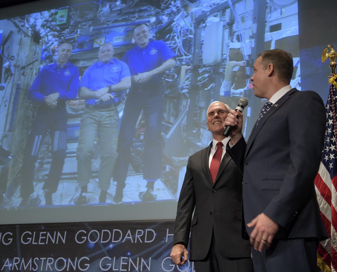 Vice President Mike Pence, and NASA Administrator Jim Bridenstine, right, talk with NASA astronauts Scott Tingle, Andrew Feustel, and Ricky Arnold who are onboard the International Space Station, Monday, April 23, 2018 at NASA Headquarters in Washington. Bridenstine was just sworn in by the Vice President as NASA's 13th Administrator. Photo Credit: (NASA/Bill Ingalls)