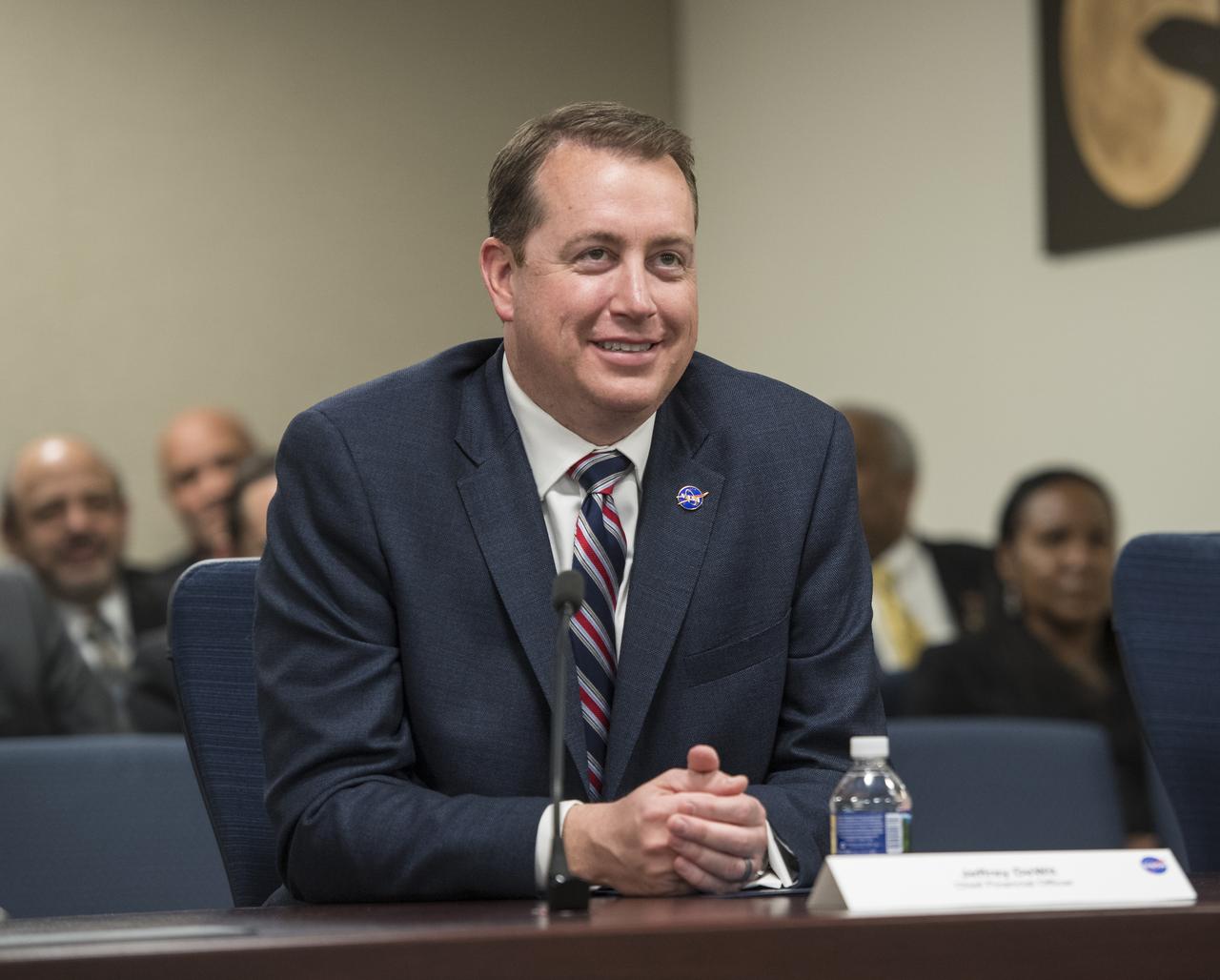 NASA Chief Financial Officer, Jeff DeWit, watches the live uplink with the crew of the International Space Station, Monday, April 23, 2018 at NASA Headquarters in Washington. Jim Bridenstine was just sworn in by the Vice President as NASA's 13th Administrator. Photo Credit: (NASA/Aubrey Gemignani)