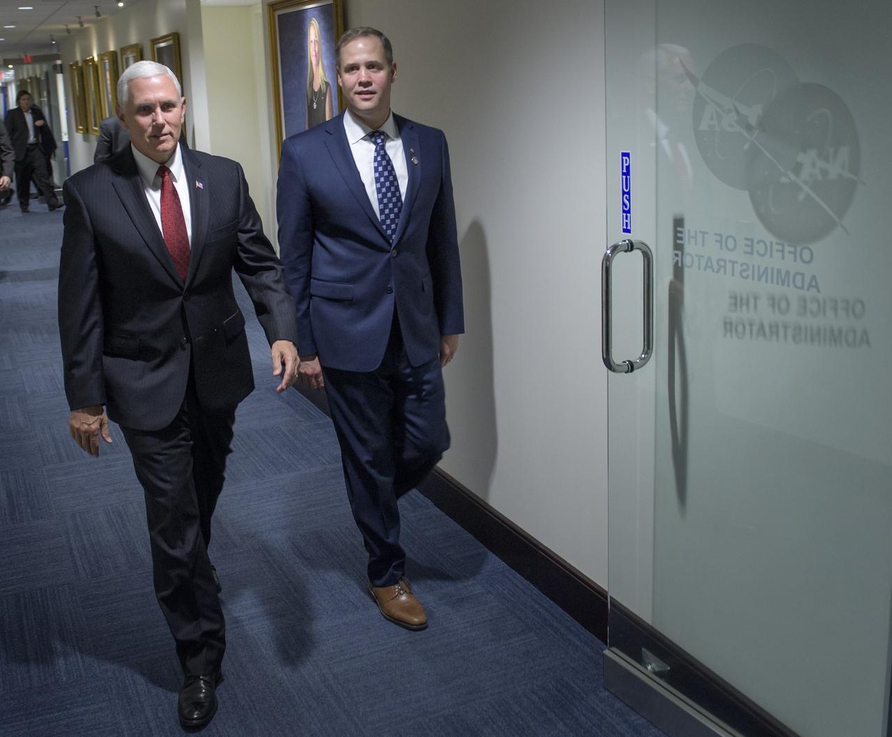 Vice President Mike Pence, left, and NASA Administrator Jim Bridenstine walk to Bridenstine's office, Monday, April 23, 2018 at NASA Headquarters in Washington. Photo Credit: (NASA/Bill Ingalls)