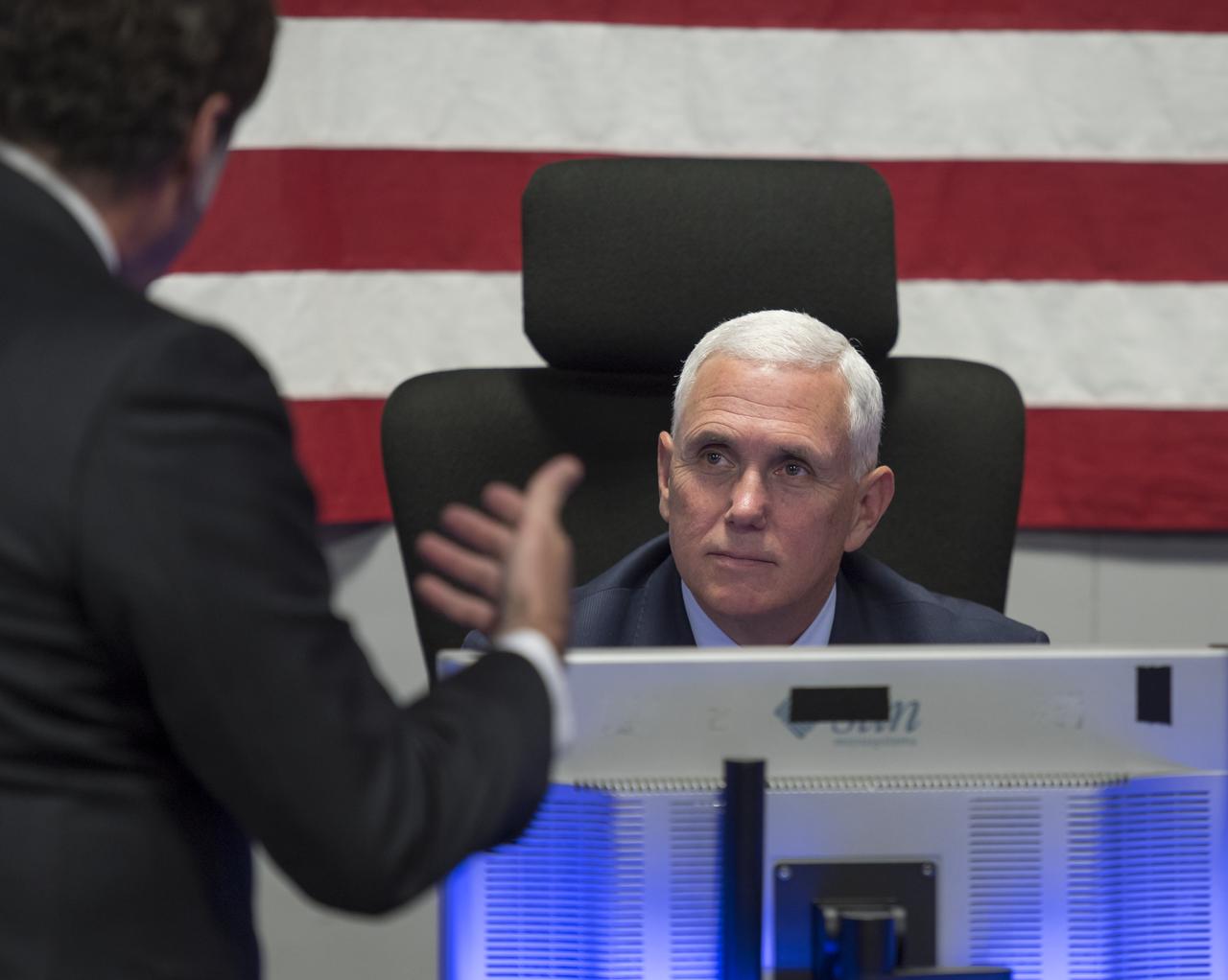JPL Director Michael Watkins, standing, explains the history of NASA's Jet Propulsion Laboratory and the use of the Mission Support Area to Vice President Mike Pence during a tour of JPL, Saturday, April 28, 2018 in Pasadena, California. Photo Credit: (NASA/Bill Ingalls)