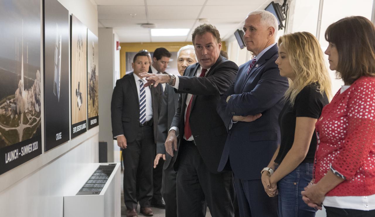JPL Director Michael Watkins, left, explains to U.S. Vice President Mike Pence, daughter of Mike Pence, Charlotte Pence, and wife of Mike Pence, Karen Pence the progress for the Mars 2020 mission while inside the Spacecraft Assembly Facility (SAF) during a tour of NASA's Jet Propulsion Laboratory, Saturday, April 28, 2018 in Pasadena, California. Photo Credit: (NASA/Bill Ingalls)