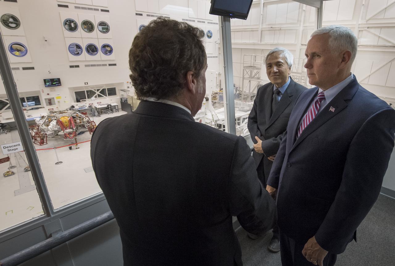 U.S. Vice President Mike Pence, right, is shown the Mars 2020 spacecraft descent stage from inside the Spacecraft Assembly Facility (SAF) by JPL Director Michael Watkins, left, and NASA Mars Exploration Manager Li Fuk at NASA's Jet Propulsion Laboratory, Saturday, April 28, 2018 in Pasadena, California. Mars 2020 is a Mars rover mission by NASA's Mars Exploration Program with a planned launch in 2020. Photo Credit: (NASA/Bill Ingalls)