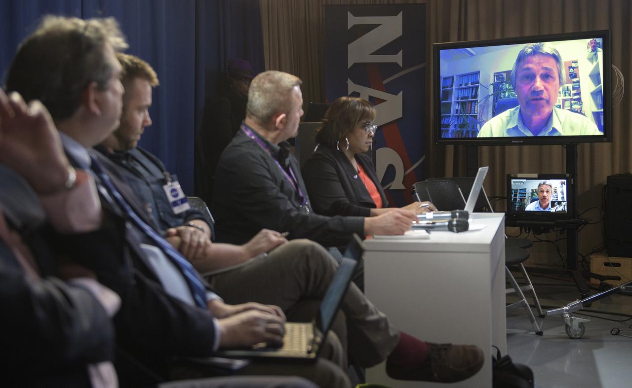 Frank Flechtner, GRACE-FO project manager for the German Research Centre for Geosciences (GFZ) in Potsdam, Germany, participates in a briefing on the upcoming launch of the Gravity Recovery and Climate Experiment Follow-On (GRACE-FO) mission via a remote video link, Monday, April 30, 2018 at NASA Headquarters in Washington. The twin GRACE-FO spacecraft will measure and monitor monthly changes in how mass is redistributed within and among Earth's atmosphere, oceans, land and ice sheets, as well as within Earth itself. Photo Credit: (NASA/Joel Kowsky)