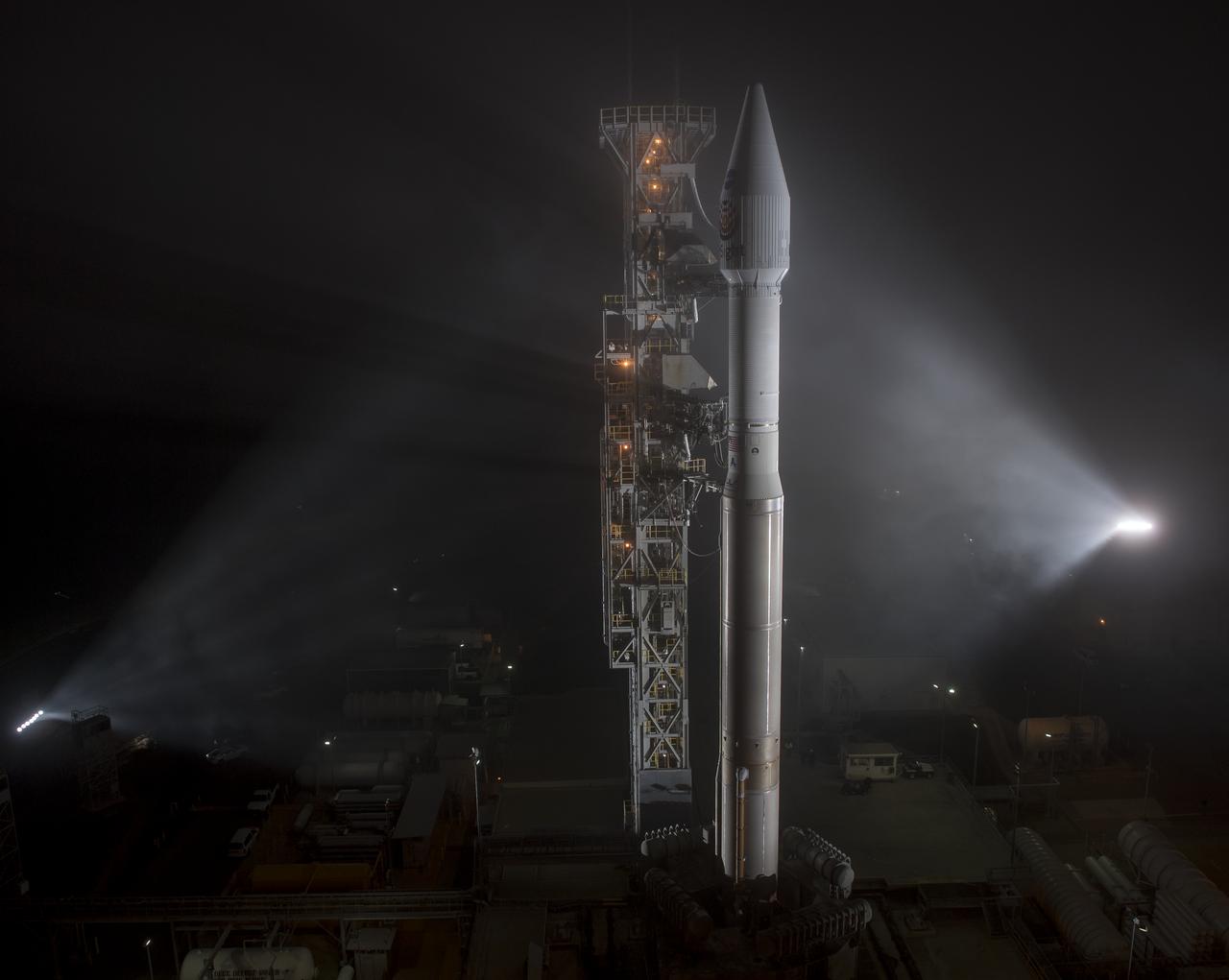 The United Launch Alliance (ULA) Atlas-V rocket with the NASA InSight spacecraft onboard is seen shortly after the mobile service tower was rolled back, Friday, May 4, 2018, at Vandenberg Air Force Base in California. InSight, short for Interior Exploration using Seismic Investigations, Geodesy and Heat Transport, is a Mars lander designed to study the "inner space" of Mars: its crust, mantle, and core. Photo Credit: (NASA/Bill Ingalls)