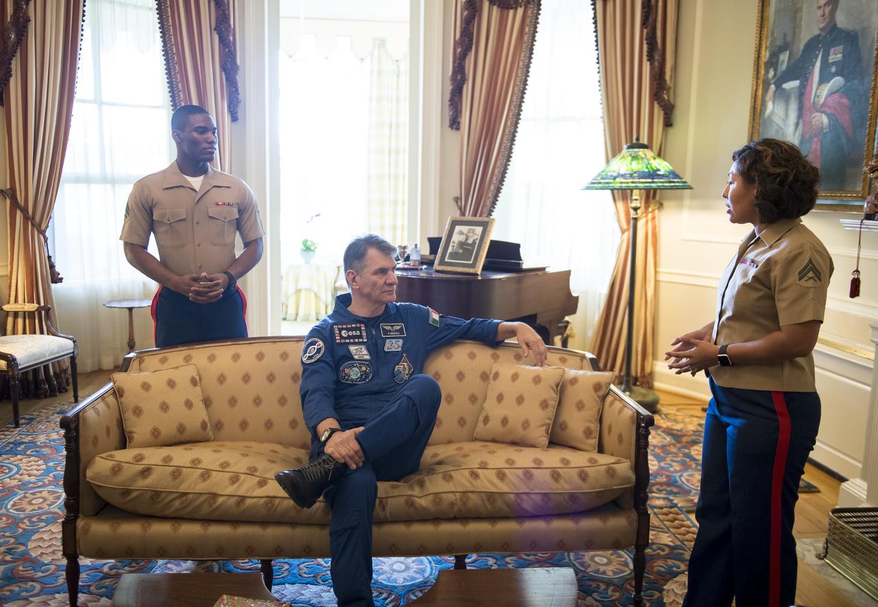 ESA astronaut Paolo Nespoli sits on a couch where Archibald Henderson, the 5th Commandant of the Marine Corps passed away in 1859, during a tour of the Home of the Commandants, Monday, May 7, 2018 in Washington. Photo Credit: (NASA/Aubrey Gemignani)