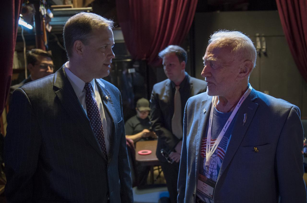 NASA Administrator Jim Bridenstine, left, meets back stage with former NASA astronaut Buzz Aldrin, prior to giving the keynote speech at the Humans to Mars Summit (H2M), Wednesday, May 9, 2018 at George Washington University in Washington. Bridenstine joined more than 20 NASA scientists and technologists at the three-day event sponsored by Explore Mars Inc. It brought industry, government and the scientific, entertainment and academic communities together to discuss technology developments, foster partnerships, and encourage students to pursue STEAM careers. Photo Credit: (NASA/Bill Ingalls)