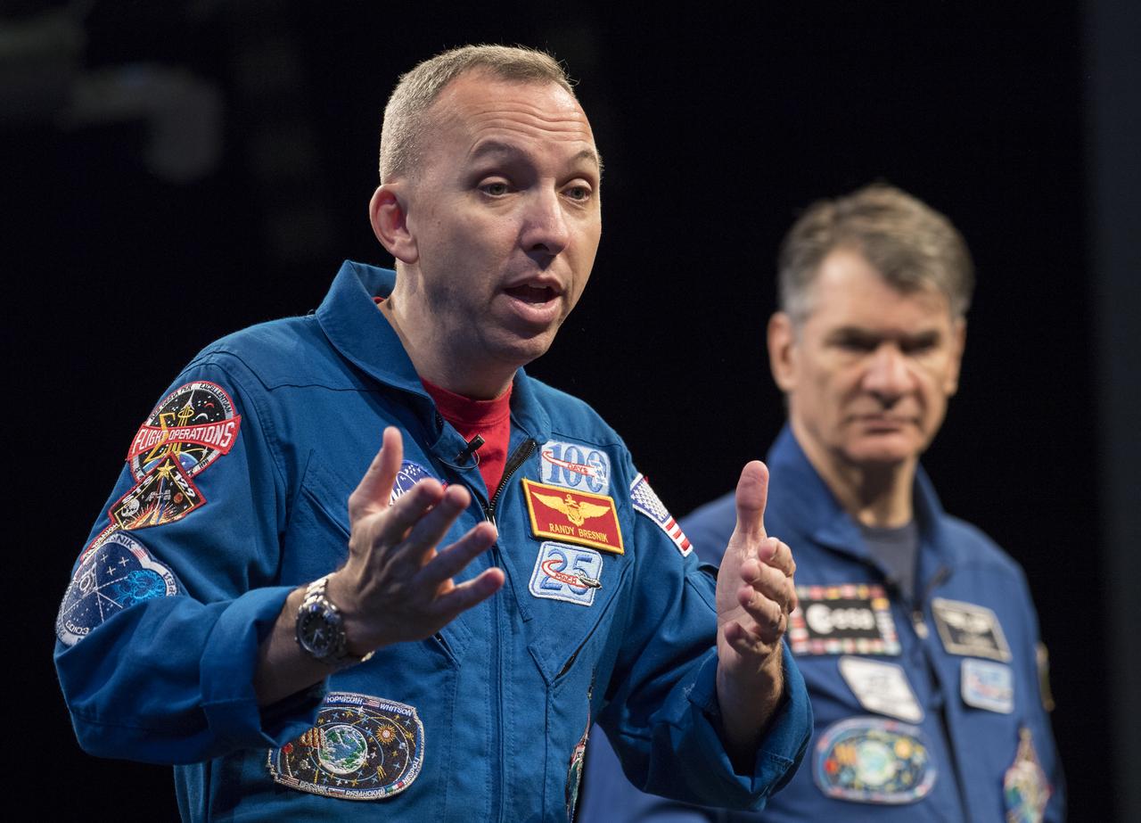 NASA astronaut Randy Bresnik, left, and ESA astronaut Paolo Nespoli, right, speak about their time onboard the International Space Station during expeditions 52/53, Thursday, May 10, 2018 at the Smithsonian National Air and Space Museum in Washington. Photo Credit: (NASA/Aubrey Gemignani)