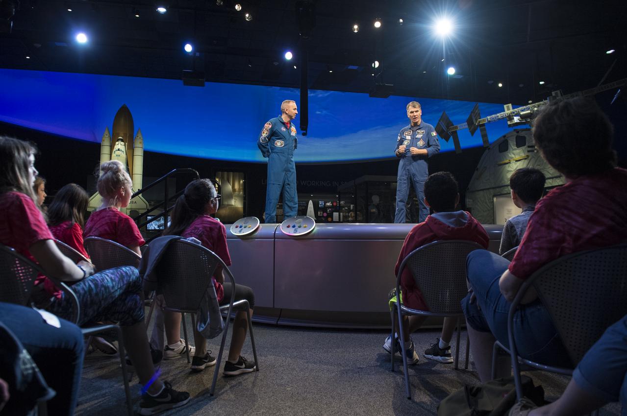 NASA astronaut Randy Bresnik, left, and ESA astronaut Paolo Nespoli, right, speak about their time onboard the International Space Station during expeditions 52/53, Thursday, May 10, 2018 at the Smithsonian National Air and Space Museum in Washington. Photo Credit: (NASA/Aubrey Gemignani)