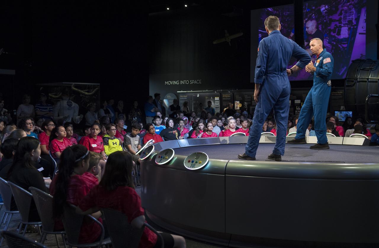 NASA astronaut Randy Bresnik, right, and ESA astronaut Paolo Nespoli, left, speak about their time onboard the International Space Station during expeditions 52/53, Thursday, May 10, 2018 at the Smithsonian National Air and Space Museum in Washington. Photo Credit: (NASA/Aubrey Gemignani)