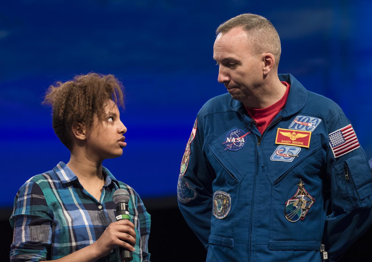 A student asks NASA astronaut Randy Bresnik a question about his time onboard the International Space Station, Thursday, May 10, 2018 at the Smithsonian National Air and Space Museum in Washington. Photo Credit: (NASA/Aubrey Gemignani)