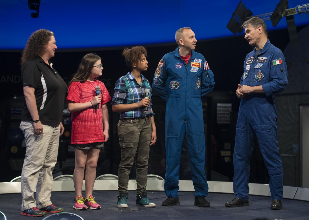 NASA astronaut Randy Bresnik, second from right, and ESA astronaut Paolo Nespoli, right, speak about their time onboard the International Space Station during expeditions 52/53, Thursday, May 10, 2018 at the Smithsonian National Air and Space Museum in Washington. Photo Credit: (NASA/Aubrey Gemignani)