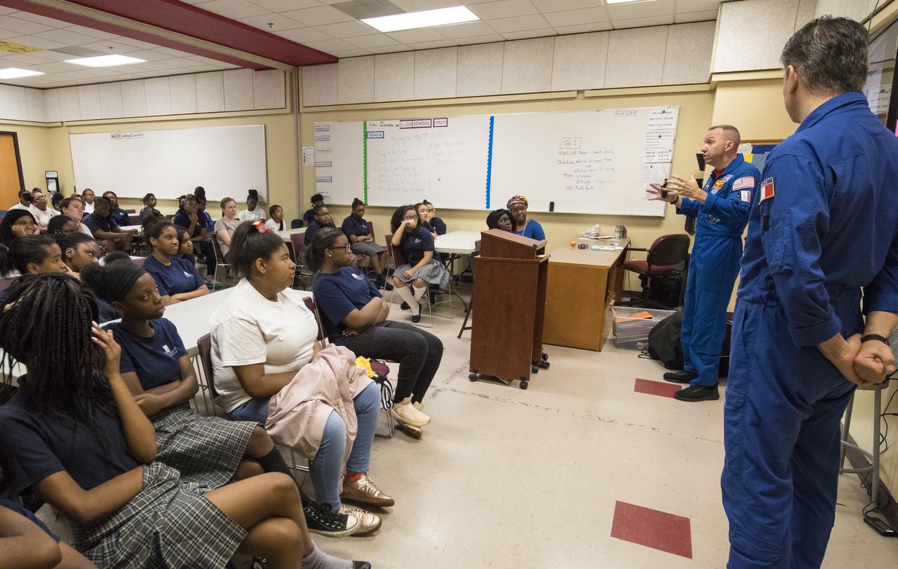NASA astronaut Randy Bresnik, left, and ESA astronaut Paolo Nespoli speak about their time onboard the International Space Station during expeditions 52/53, Friday, May 11, 2018 at the Washington School for Girls in Washington. Photo Credit: (NASA/Aubrey Gemignani)