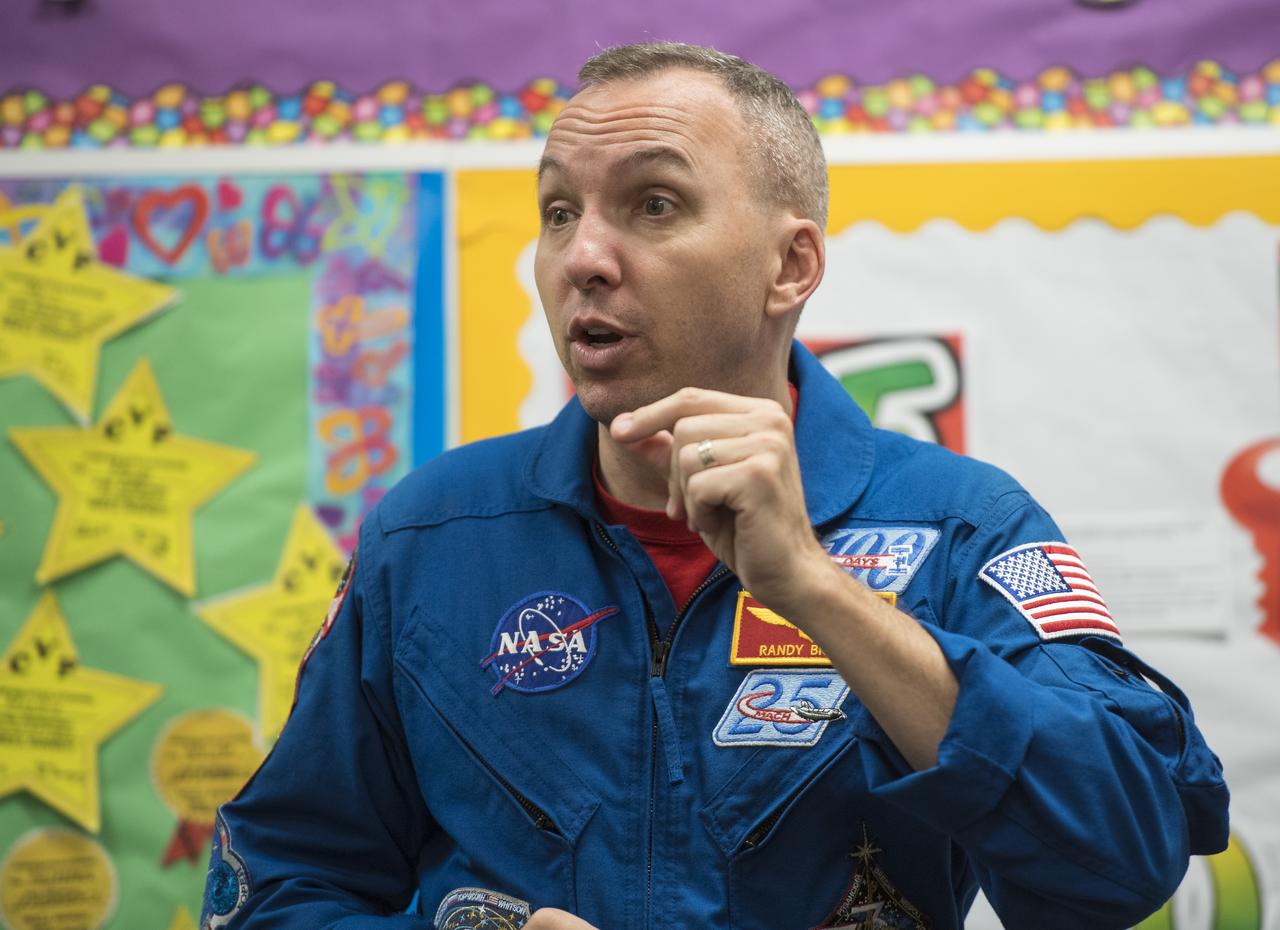 NASA astronaut Randy Bresnik speaks about his time onboard the International Space Station during expeditions 52/53, Friday, May 11, 2018 at the Washington School for Girls in Washington. Photo Credit: (NASA/Aubrey Gemignani)