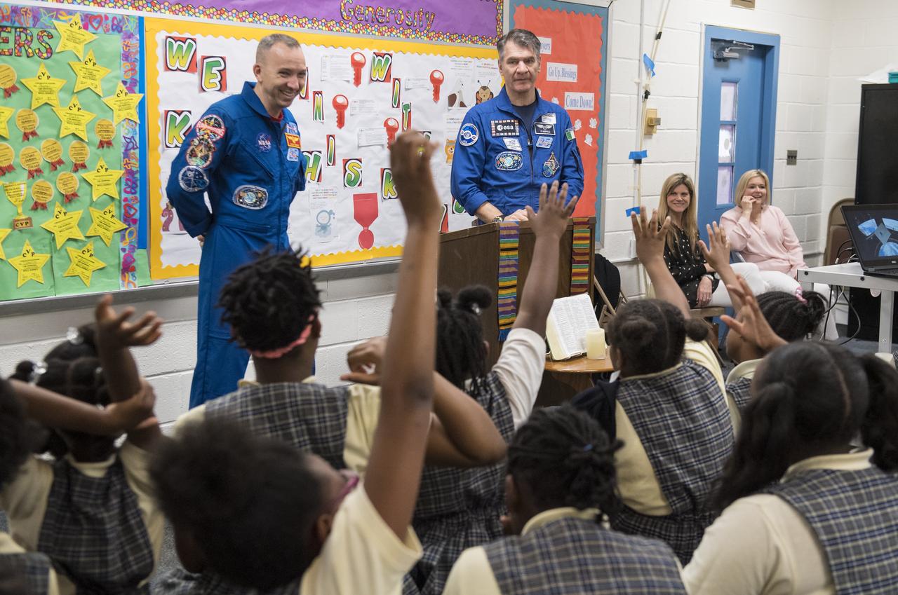 NASA astronaut Randy Bresnik, left, and ESA astronaut Paolo Nespoli answer questions about their time onboard the International Space Station during expeditions 52/53, Friday, May 11, 2018 at the Washington School for Girls in Washington. Photo Credit: (NASA/Aubrey Gemignani)