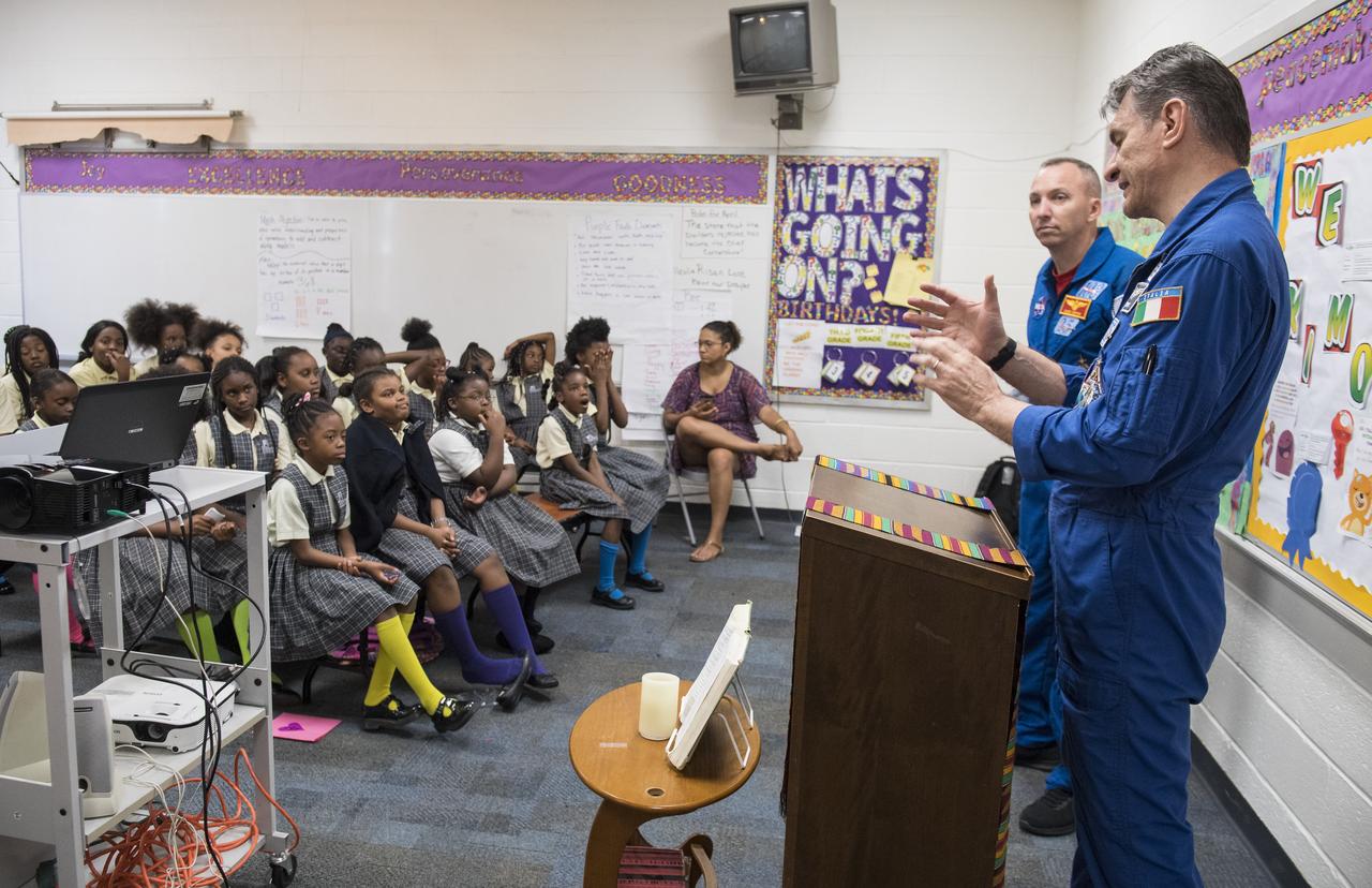 NASA astronaut Randy Bresnik, left, and ESA astronaut Paolo Nespoli answer questions about their time onboard the International Space Station during expeditions 52/53, Friday, May 11, 2018 at the Washington School for Girls in Washington. Photo Credit: (NASA/Aubrey Gemignani)