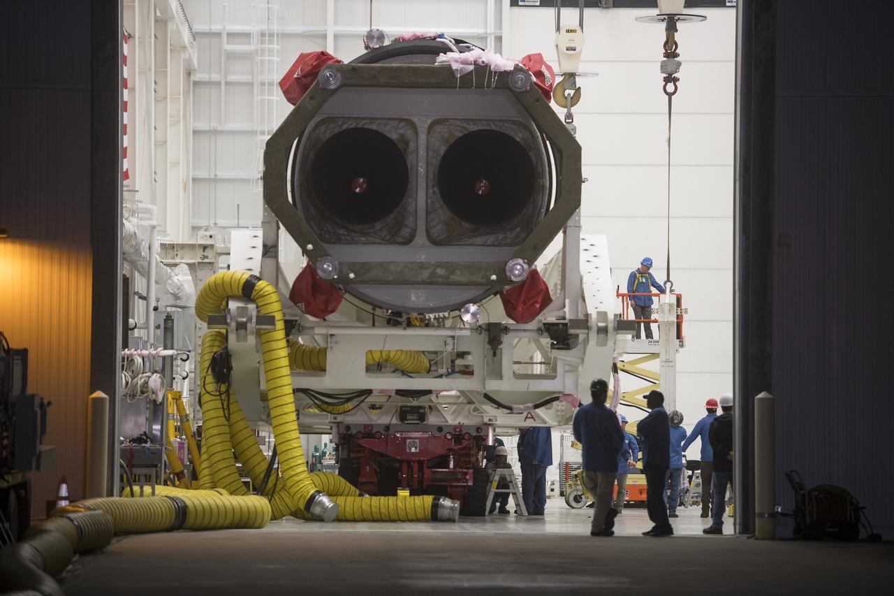 An Orbital ATK rocket is seen just before it is rolled out to launch Pad-0A at Wallops Flight Facility Thursday, May 17, 2018 at Wallops Island, VA. The Antares will launch a Cygnus spacecraft on a cargo resupply mission to the International Space Station. The mission is Orbital ATK’s ninth contracted cargo delivery flight to the space station for NASA. Included in the 7,400 pounds of cargo onboard Cygnus, are science experiments, crew supplies, and vehicle hardware. Photo Credit: (NASA/Aubrey Gemignani)