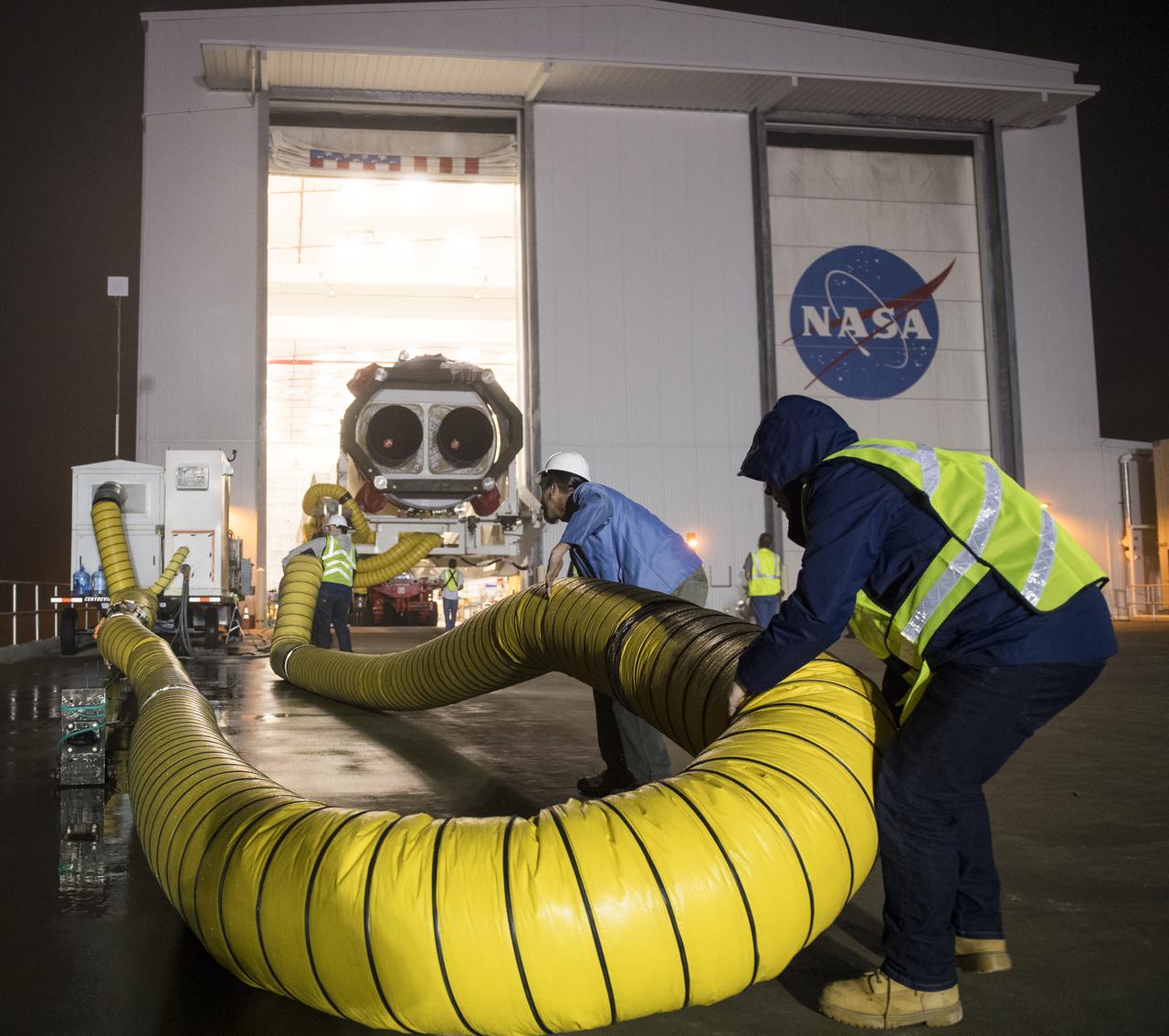 An Orbital ATK rocket is seen as it is rolled out to launch Pad-0A at Wallops Flight Facility Thursday, May 17, 2018 at Wallops Island, VA. The Antares will launch a Cygnus spacecraft on a cargo resupply mission to the International Space Station. The mission is Orbital ATK’s ninth contracted cargo delivery flight to the space station for NASA. Included in the 7,400 pounds of cargo onboard Cygnus, are science experiments, crew supplies, and vehicle hardware. Photo Credit: (NASA/Aubrey Gemignani)