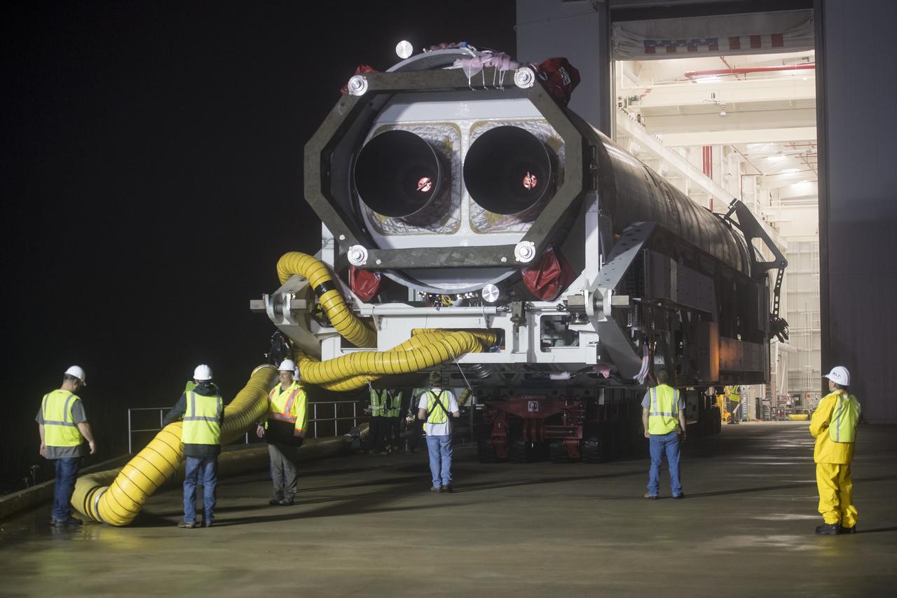 An Orbital ATK rocket is seen as it is rolled out to launch Pad-0A at Wallops Flight Facility Thursday, May 17, 2018 at Wallops Island, VA. The Antares will launch a Cygnus spacecraft on a cargo resupply mission to the International Space Station. The mission is Orbital ATK’s ninth contracted cargo delivery flight to the space station for NASA. Included in the 7,400 pounds of cargo onboard Cygnus, are science experiments, crew supplies, and vehicle hardware. Photo Credit: (NASA/Aubrey Gemignani)
