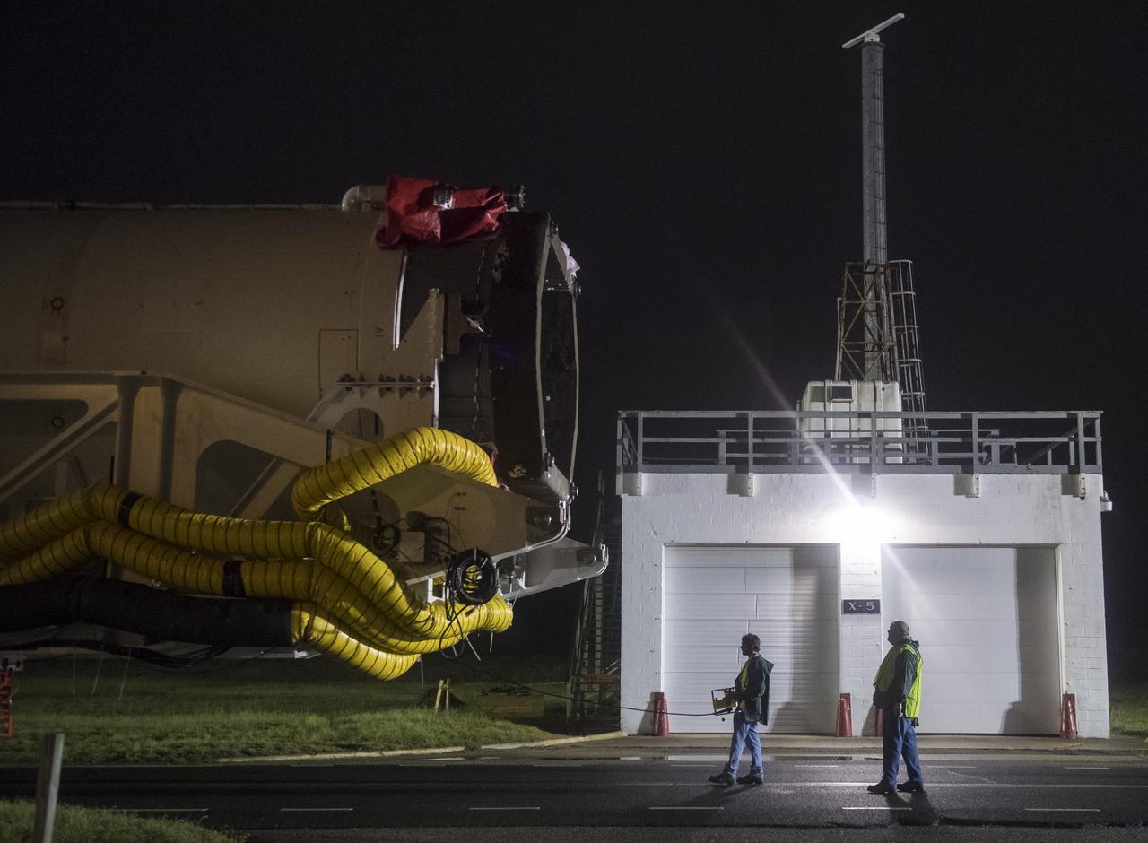 An Orbital ATK rocket is seen as it is rolled out to launch Pad-0A at Wallops Flight Facility Thursday, May 17, 2018 at Wallops Island, VA. The Antares will launch a Cygnus spacecraft on a cargo resupply mission to the International Space Station. The mission is Orbital ATK’s ninth contracted cargo delivery flight to the space station for NASA. Included in the 7,400 pounds of cargo onboard Cygnus, are science experiments, crew supplies, and vehicle hardware. Photo Credit: (NASA/Aubrey Gemignani)