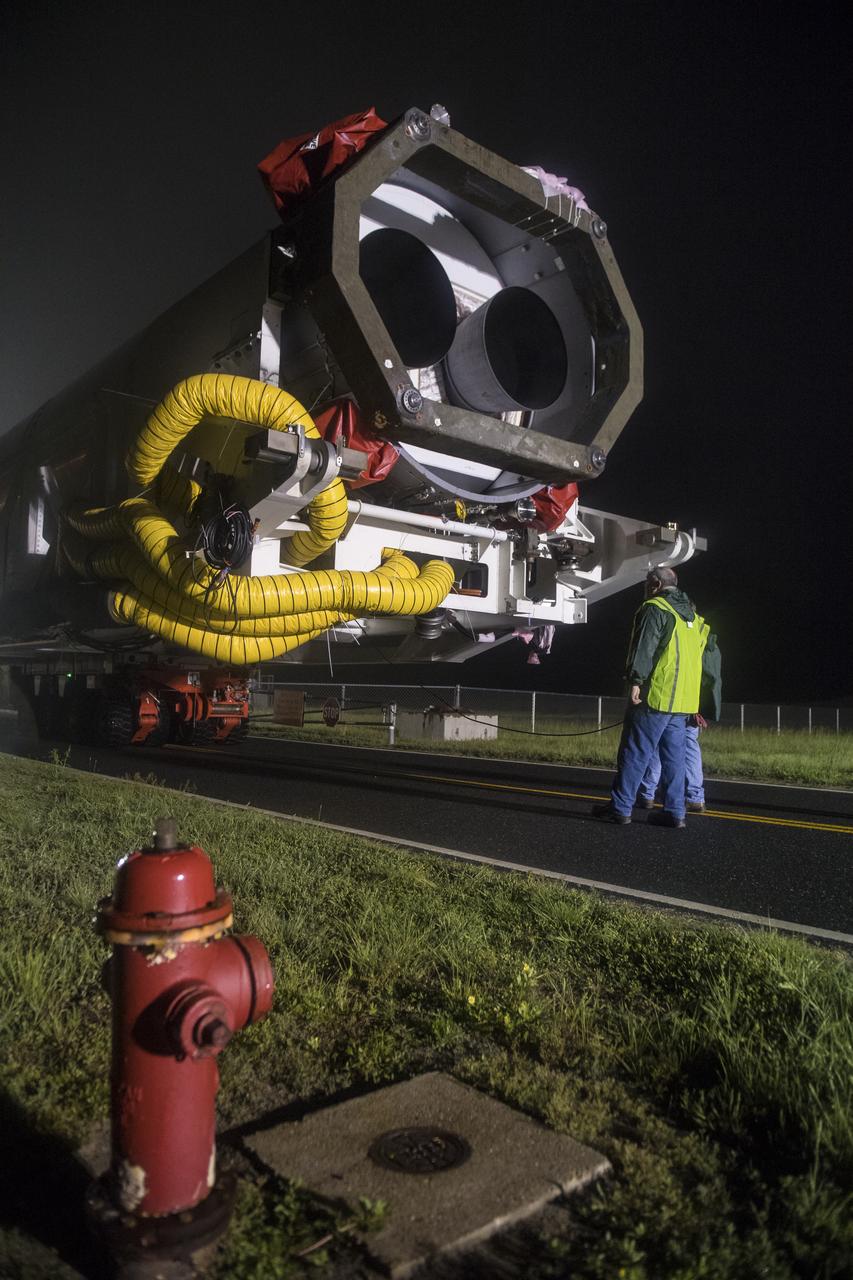An Orbital ATK rocket is seen as it is rolled out to launch Pad-0A at Wallops Flight Facility Thursday, May 17, 2018 at Wallops Island, VA. The Antares will launch a Cygnus spacecraft on a cargo resupply mission to the International Space Station. The mission is Orbital ATK’s ninth contracted cargo delivery flight to the space station for NASA. Included in the 7,400 pounds of cargo onboard Cygnus, are science experiments, crew supplies, and vehicle hardware. Photo Credit: (NASA/Aubrey Gemignani)
