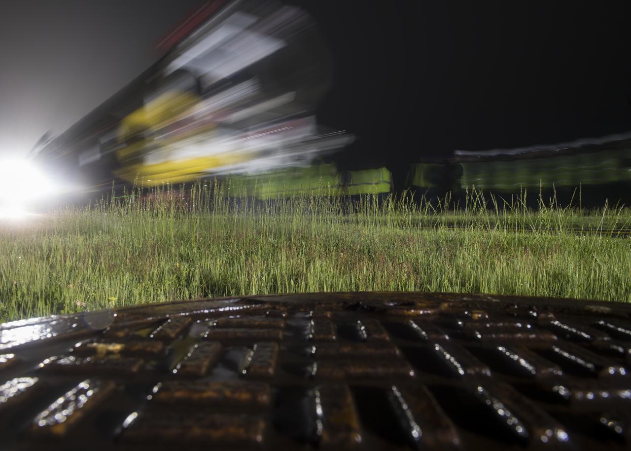 An Orbital ATK rocket is seen in this long exposure as it is rolled out to launch Pad-0A at Wallops Flight Facility Thursday, May 17, 2018 at Wallops Island, VA. The Antares will launch a Cygnus spacecraft on a cargo resupply mission to the International Space Station. The mission is Orbital ATK’s ninth contracted cargo delivery flight to the space station for NASA. Included in the 7,400 pounds of cargo onboard Cygnus, are science experiments, crew supplies, and vehicle hardware. Photo Credit: (NASA/Aubrey Gemignani)