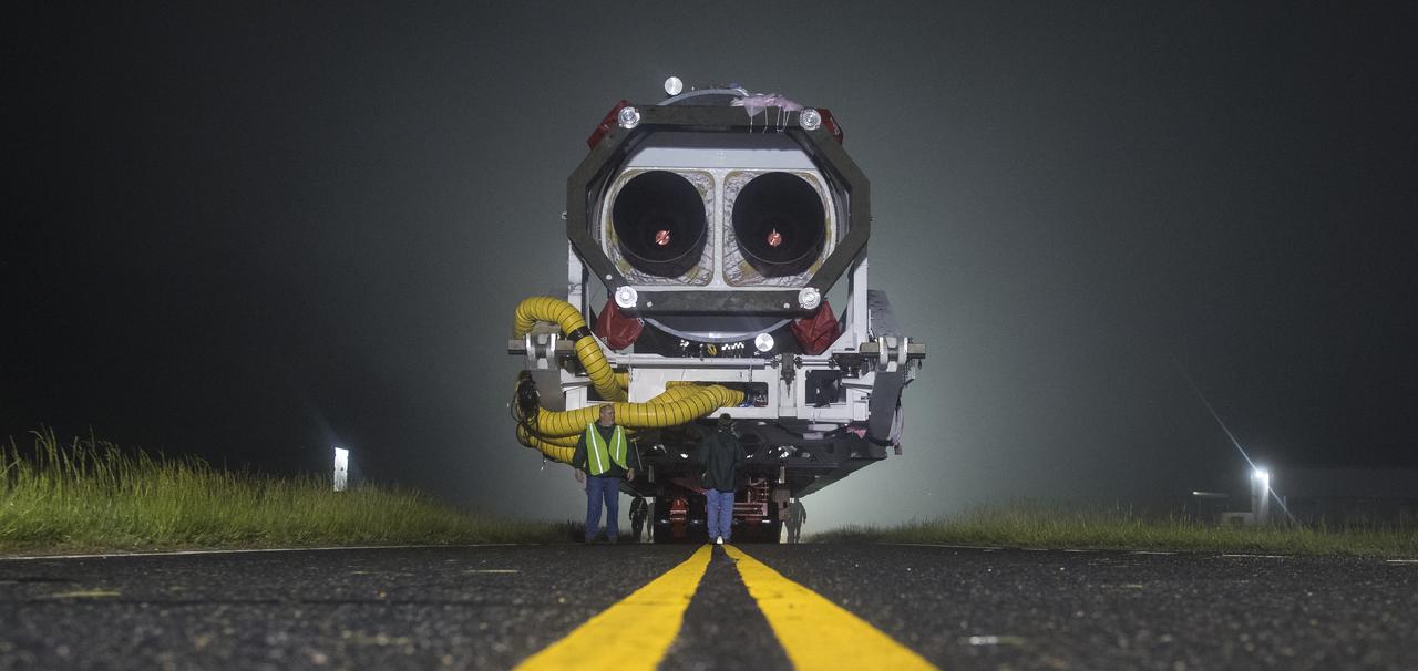 An Orbital ATK rocket is seen as it is rolled out to launch Pad-0A at Wallops Flight Facility Thursday, May 17, 2018 at Wallops Island, VA. The Antares will launch a Cygnus spacecraft on a cargo resupply mission to the International Space Station. The mission is Orbital ATK’s ninth contracted cargo delivery flight to the space station for NASA. Included in the 7,400 pounds of cargo onboard Cygnus, are science experiments, crew supplies, and vehicle hardware. Photo Credit: (NASA/Aubrey Gemignani)