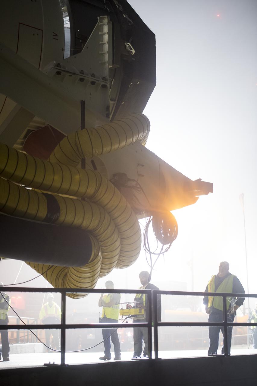 An Orbital ATK rocket is seen as it is rolled out to launch Pad-0A at Wallops Flight Facility Thursday, May 17, 2018 at Wallops Island, VA. The Antares will launch a Cygnus spacecraft on a cargo resupply mission to the International Space Station. The mission is Orbital ATK’s ninth contracted cargo delivery flight to the space station for NASA. Included in the 7,400 pounds of cargo onboard Cygnus, are science experiments, crew supplies, and vehicle hardware. Photo Credit: (NASA/Aubrey Gemignani)