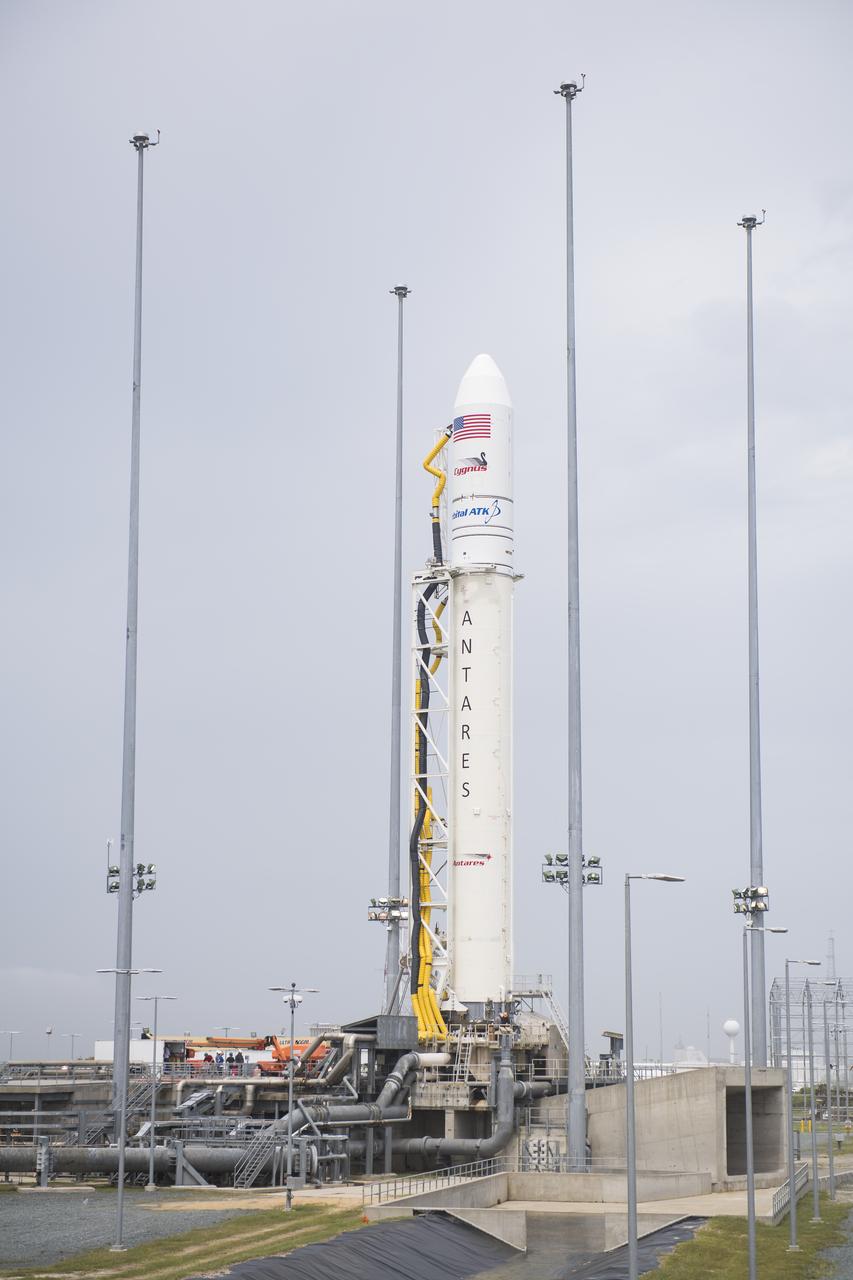 The Orbital ATK Antares rocket, with the Cygnus spacecraft onboard, is seen at launch Pad-0A, Saturday, May 19, 2018 at Wallops Flight Facility in Virginia. The Antares will launch with the Cygnus spacecraft filled with 7,400 pounds of cargo for the International Space Station (ISS), including science experiments, crew supplies, and vehicle hardware. The mission is Orbital ATK's ninth contracted cargo delivery flight to ISS for NASA. Photo Credit: (NASA/Aubrey Gemignani)