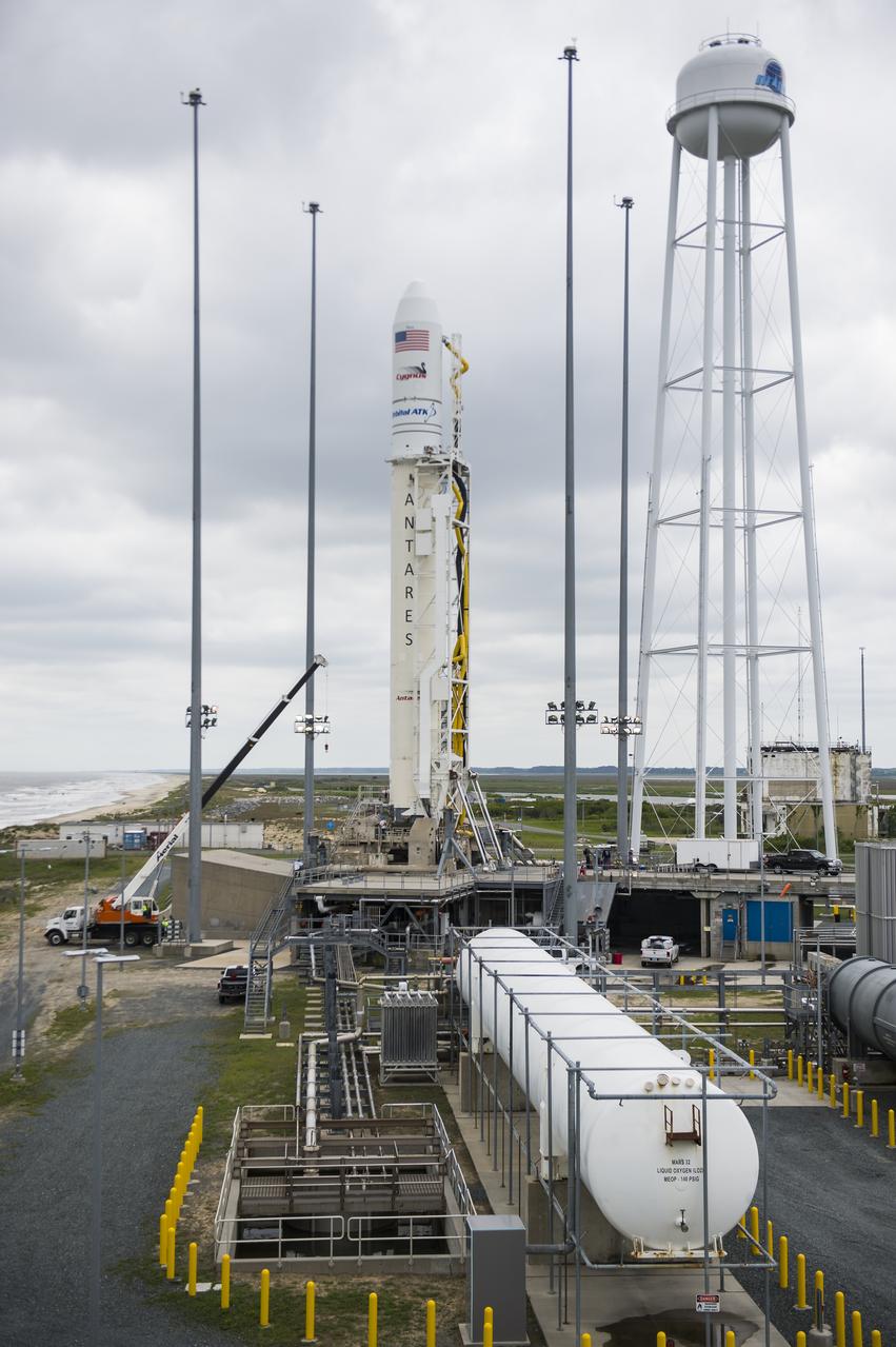 The Orbital ATK Antares rocket, with the Cygnus spacecraft onboard, is seen at launch Pad-0A, Sunday, May 20, 2018 at Wallops Flight Facility in Virginia. The Antares will launch with the Cygnus spacecraft filled with 7,400 pounds of cargo for the International Space Station (ISS), including science experiments, crew supplies, and vehicle hardware. The mission is Orbital ATK's ninth contracted cargo delivery flight to ISS for NASA. Photo Credit: (NASA/Aubrey Gemignani)