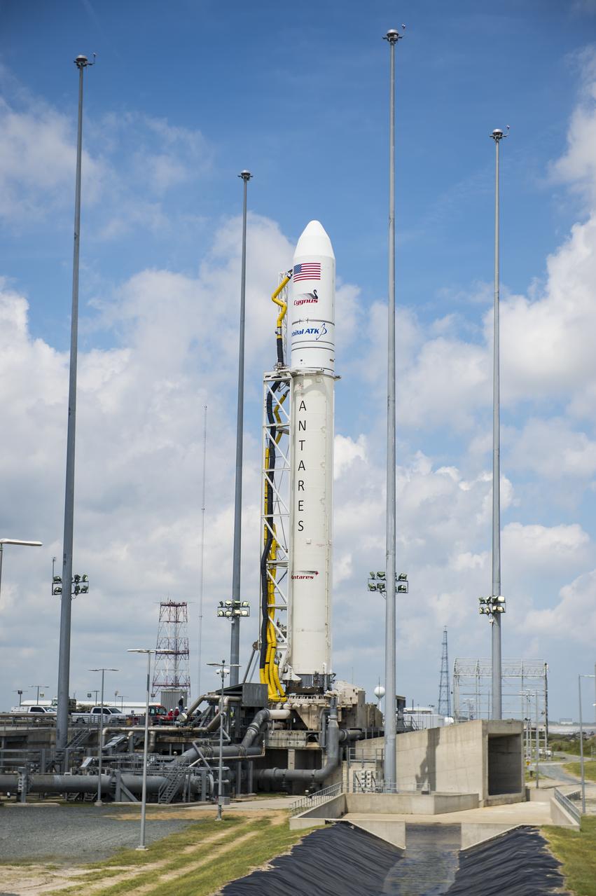 The Orbital ATK Antares rocket, with the Cygnus spacecraft onboard, is seen at launch Pad-0A, Sunday, May 20, 2018 at Wallops Flight Facility in Virginia. The Antares will launch with the Cygnus spacecraft filled with 7,400 pounds of cargo for the International Space Station (ISS), including science experiments, crew supplies, and vehicle hardware. The mission is Orbital ATK's ninth contracted cargo delivery flight to ISS for NASA. Photo Credit: (NASA/Aubrey Gemignani)