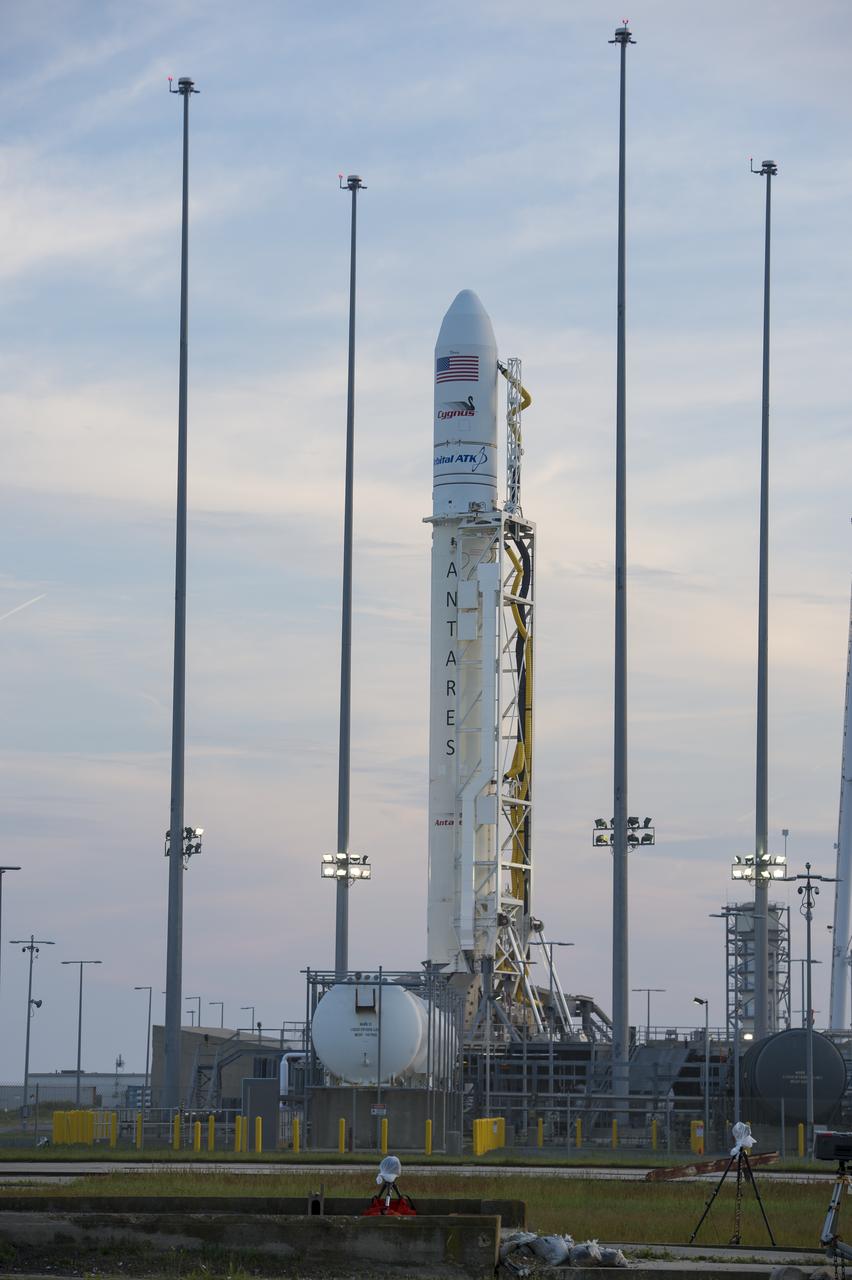 The Orbital ATK Antares rocket, with the Cygnus spacecraft onboard, is seen at launch Pad-0A, Sunday, May 20, 2018 at Wallops Flight Facility in Virginia. The Antares will launch with the Cygnus spacecraft filled with 7,400 pounds of cargo for the International Space Station (ISS), including science experiments, crew supplies, and vehicle hardware. The mission is Orbital ATK's ninth contracted cargo delivery flight to ISS for NASA. Photo Credit: (NASA/Aubrey Gemignani)