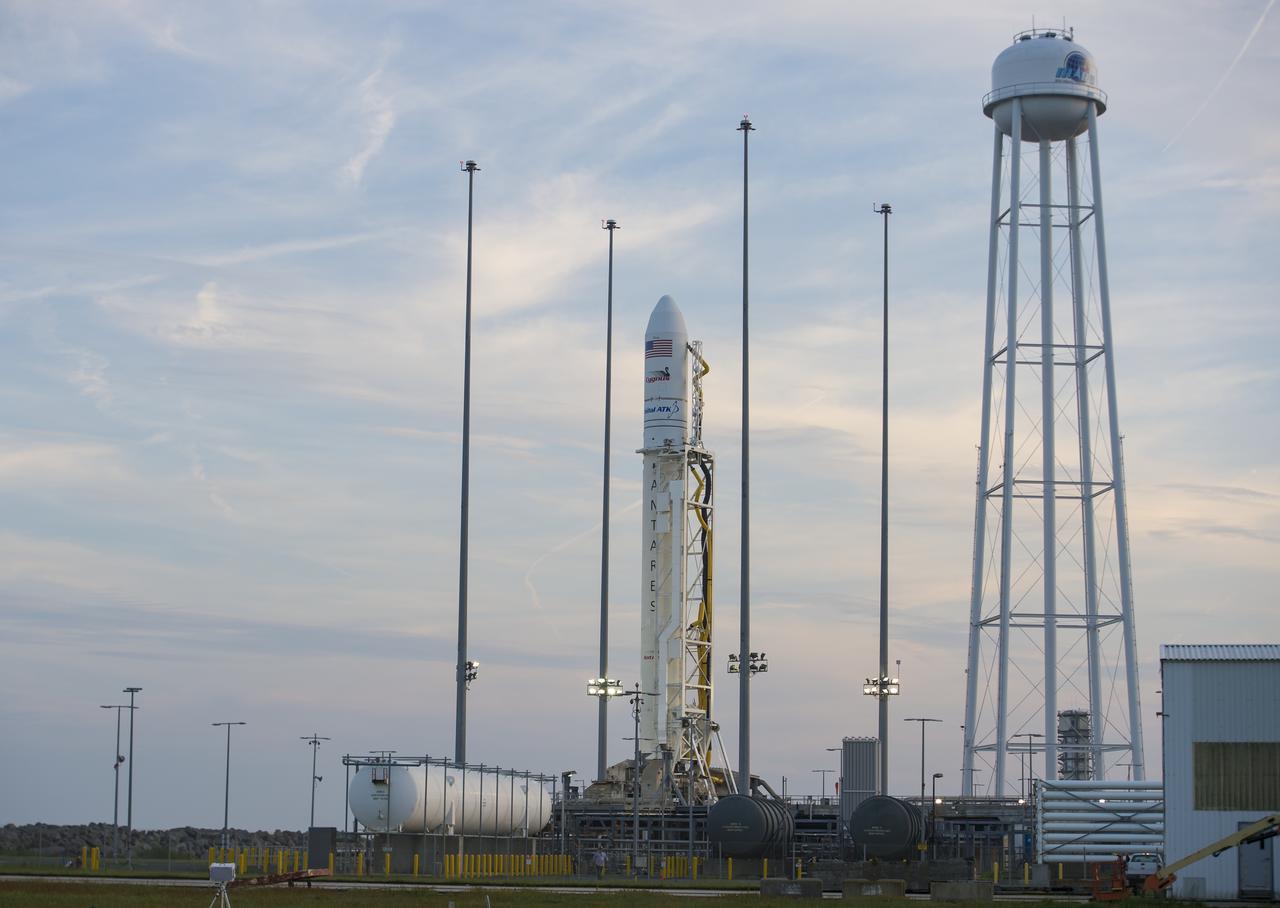 The Orbital ATK Antares rocket, with the Cygnus spacecraft onboard, is seen at launch Pad-0A, Sunday, May 20, 2018 at Wallops Flight Facility in Virginia. The Antares will launch with the Cygnus spacecraft filled with 7,400 pounds of cargo for the International Space Station (ISS), including science experiments, crew supplies, and vehicle hardware. The mission is Orbital ATK's ninth contracted cargo delivery flight to ISS for NASA. Photo Credit: (NASA/Aubrey Gemignani)