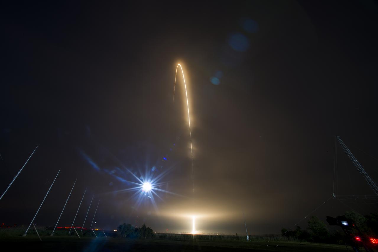 The Orbital ATK Antares rocket, with the Cygnus spacecraft onboard, launches from Pad-0A, Monday, May 21, 2018 at NASA's Wallops Flight Facility in Virginia. Orbital ATK’s ninth contracted cargo resupply mission with NASA to the International Space Station will deliver approximately 7,400 pounds of science and research, crew supplies and vehicle hardware to the orbital laboratory and its crew. Photo Credit: (NASA/Aubrey Gemignani)