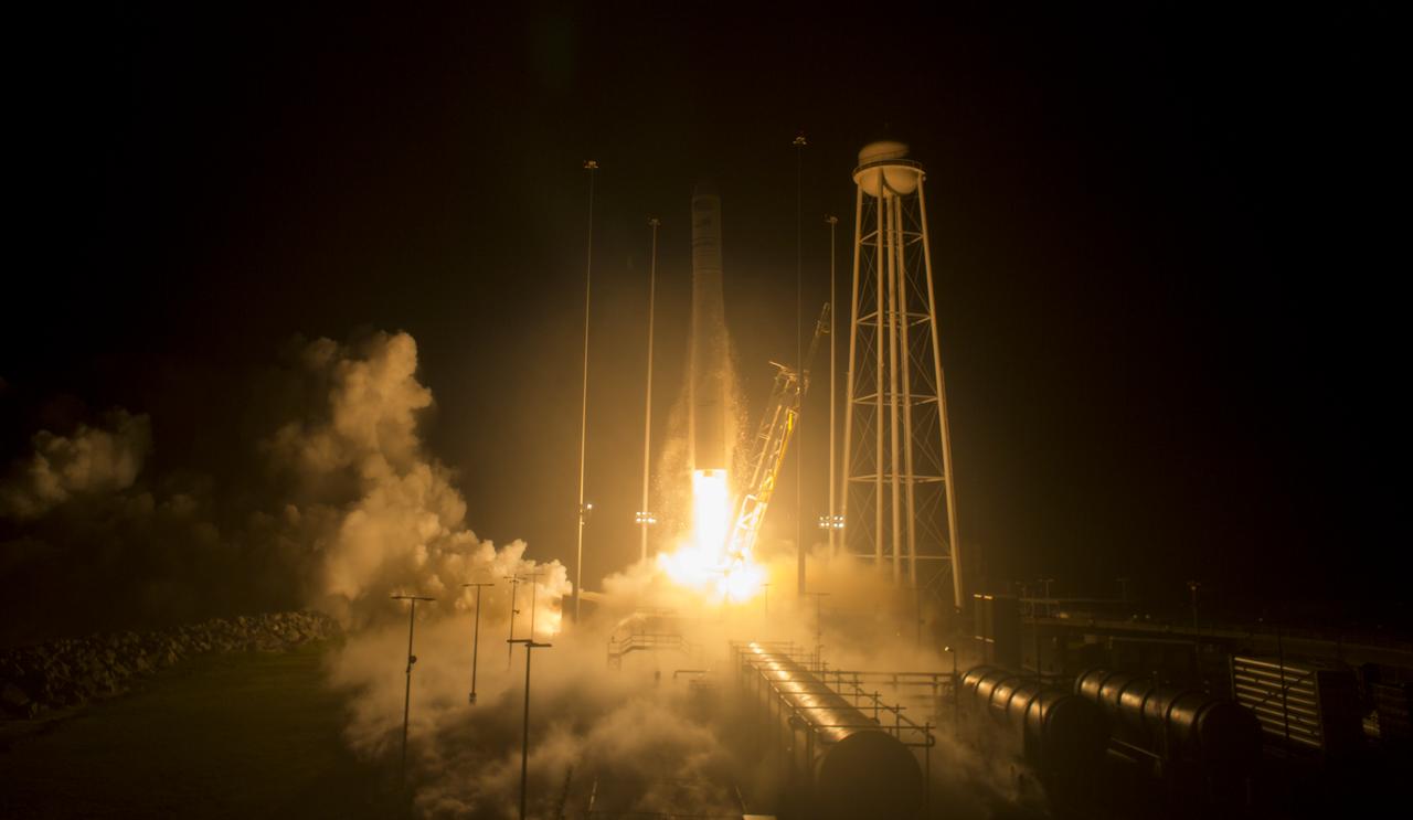 The Orbital ATK Antares rocket, with the Cygnus spacecraft onboard, launches from Pad-0A, Monday, May 21, 2018 at NASA's Wallops Flight Facility in Virginia. Orbital ATK’s ninth contracted cargo resupply mission with NASA to the International Space Station will deliver approximately 7,400 pounds of science and research, crew supplies and vehicle hardware to the orbital laboratory and its crew. Photo Credit: (NASA/Aubrey Gemignani)