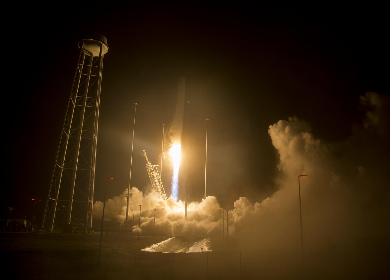 The Orbital ATK Antares rocket, with the Cygnus spacecraft onboard, launches from Pad-0A, Monday, May 21, 2018 at NASA's Wallops Flight Facility in Virginia. Orbital ATK’s ninth contracted cargo resupply mission with NASA to the International Space Station will deliver approximately 7,400 pounds of science and research, crew supplies and vehicle hardware to the orbital laboratory and its crew. Photo Credit: (NASA/Aubrey Gemignani)