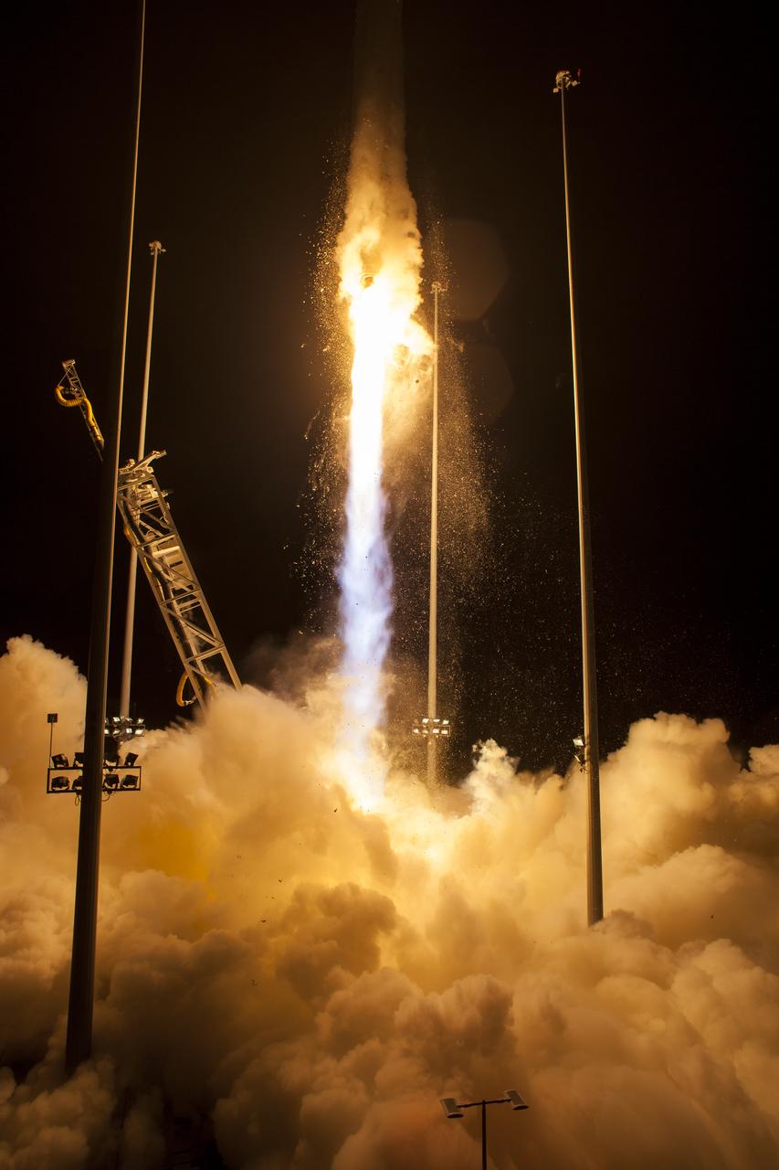 The Orbital ATK Antares rocket, with the Cygnus spacecraft onboard, launches from Pad-0A, Monday, May 21, 2018 at NASA's Wallops Flight Facility in Virginia. Orbital ATK’s ninth contracted cargo resupply mission with NASA to the International Space Station will deliver approximately 7,400 pounds of science and research, crew supplies and vehicle hardware to the orbital laboratory and its crew. Photo Credit: (NASA/Aubrey Gemignani)