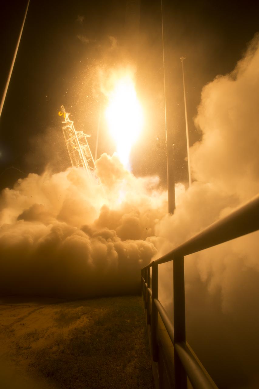 The Orbital ATK Antares rocket, with the Cygnus spacecraft onboard, launches from Pad-0A, Monday, May 21, 2018 at NASA's Wallops Flight Facility in Virginia. Orbital ATK’s ninth contracted cargo resupply mission with NASA to the International Space Station will deliver approximately 7,400 pounds of science and research, crew supplies and vehicle hardware to the orbital laboratory and its crew. Photo Credit: (NASA/Aubrey Gemignani)