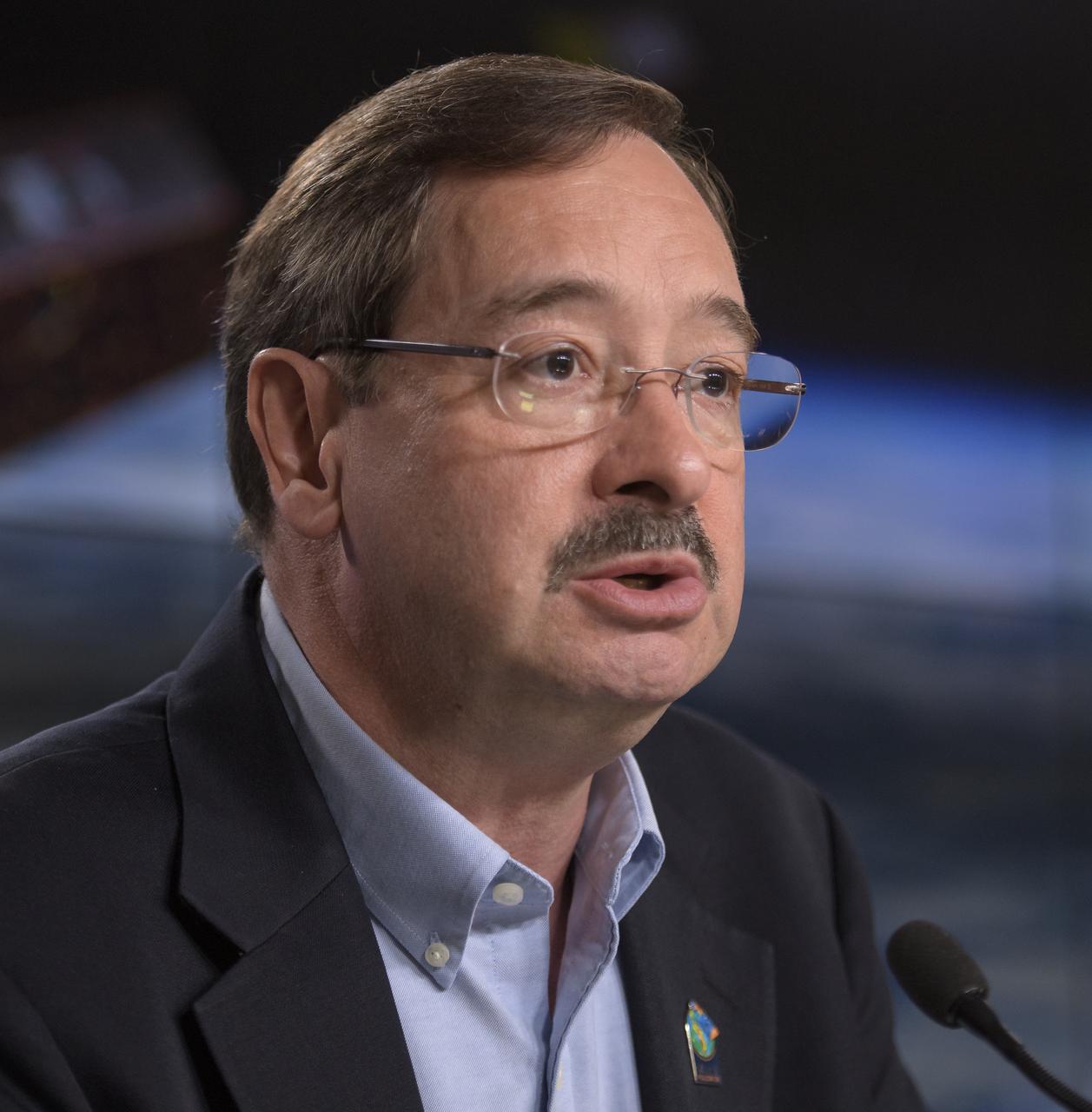 David Jarrett, GRACE-FO program executive in the Earth Science Division at NASA Headquarters, discusses the Gravity Recovery and Climate Experiment Follow-On (GRACE-FO) mission during a prelaunch media briefing, Monday, May 21, 2018, at Vandenberg Air Force Base in California. The twin GRACE-FO spacecraft will measure changes in how mass is redistributed within and among Earth's atmosphere, oceans, land and ice sheets, as well as within Earth itself. Photo Credit: (NASA/Bill Ingalls)